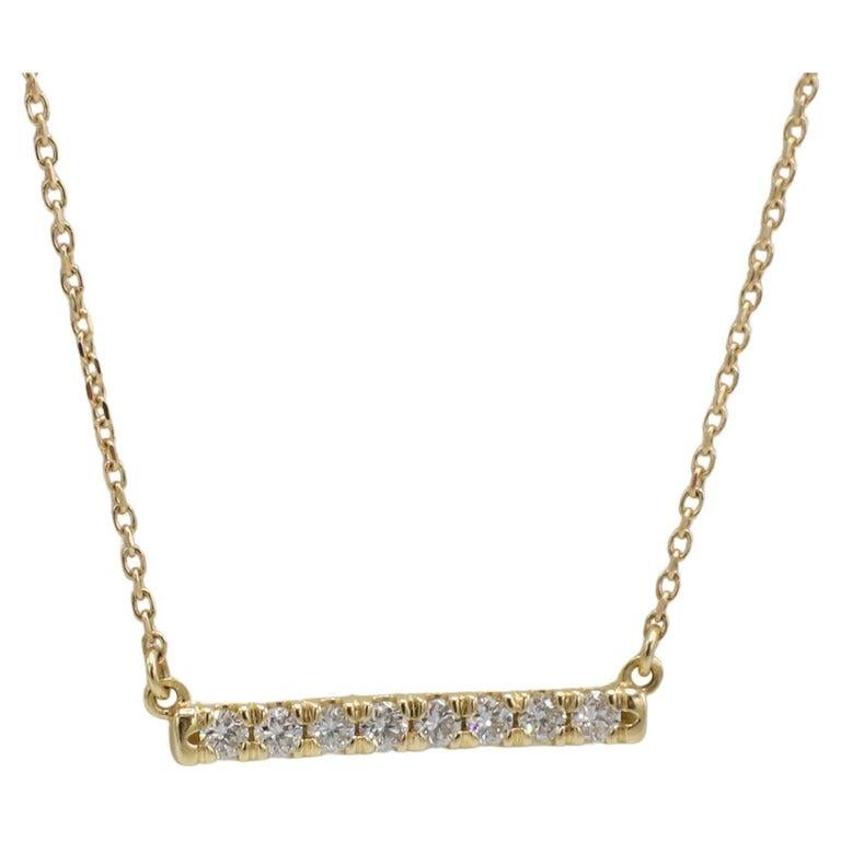 14K Yellow Gold .25 Carat Natural Diamond French-Set Bar Necklace
Metal: 14k white gold
Weight: 1.86 grams
Diamonds. 0.25 carats G-H VS round natural diamonds
Bar: 19.5mm
Chain length: 16 inches
Note: Also available in white gold and rose gold 