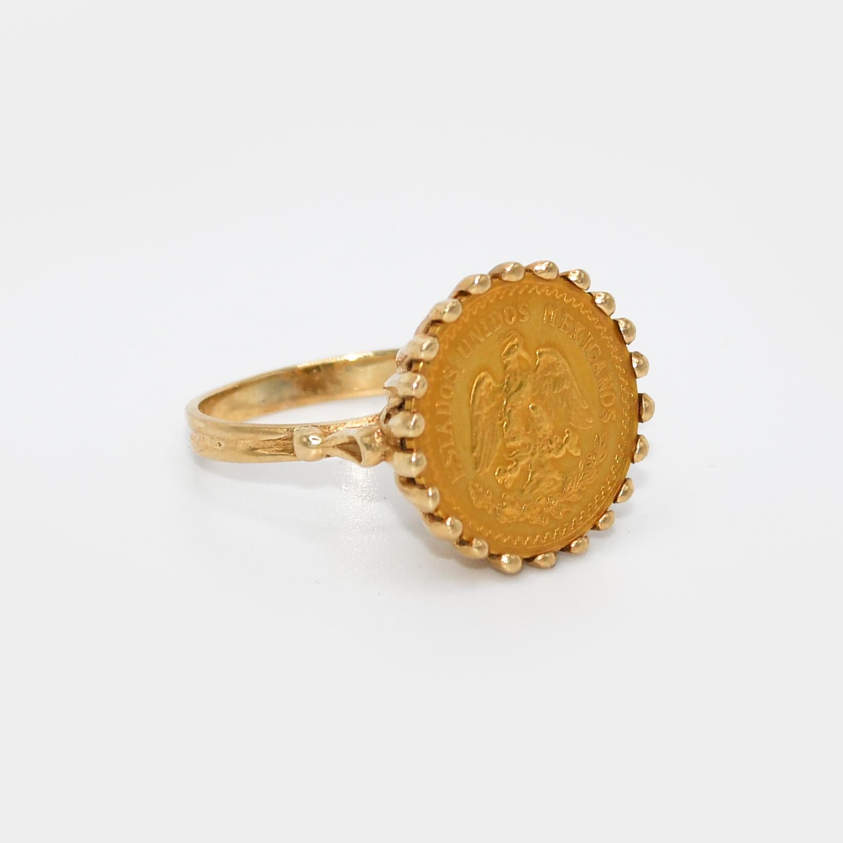 14k Yellow Gold 2.50 Mexican Peso Ring.
The pesos agw is .0603ozt.
The ring is 14k, total weight 5.9gr.
Size 6 1/4. Can be size up or down one size for additional fee