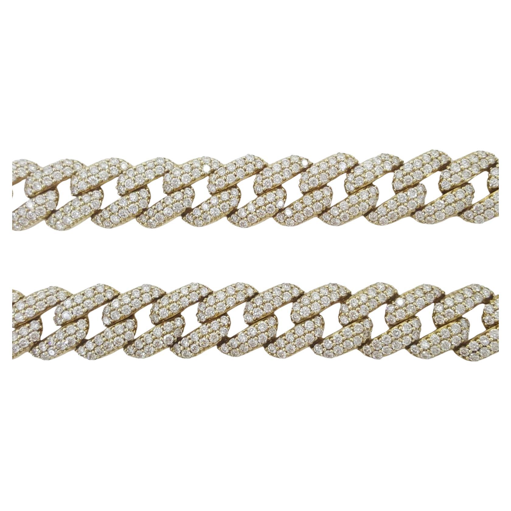 Collana a catena Cuban Link in oro giallo 14K da 25,7 carati con diamanti rotondi a taglio brillante

Questa audace e lussuosa collana a catena a maglie cubane è finemente realizzata in oro giallo massiccio 14K, con un peso di 75,6 grammi. Con una