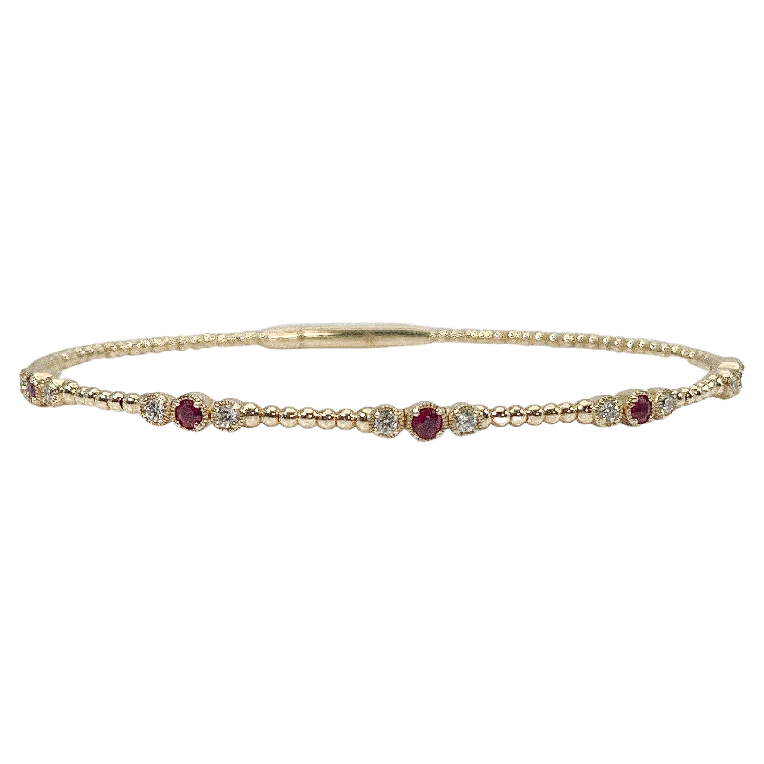 14K Yellow Gold .25CTW Diamond and .29CTW Ruby Bangle  For Sale