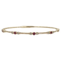 14K Yellow Gold .25CTW Diamond and .29CTW Ruby Bangle 