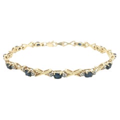 14k Yellow Gold 2.5ctw Oval Sapphire 
Round Diamond Figure X Link Bracelet
