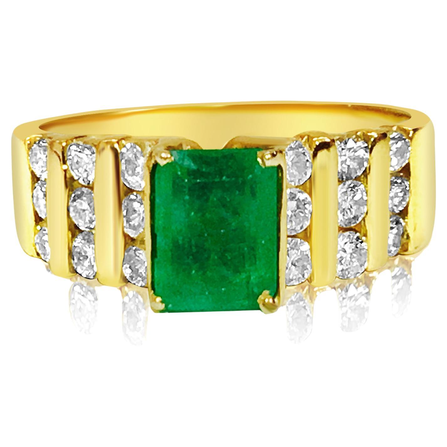 14k Yellow Gold. 2.70 Carat Diamond Emerald Ring