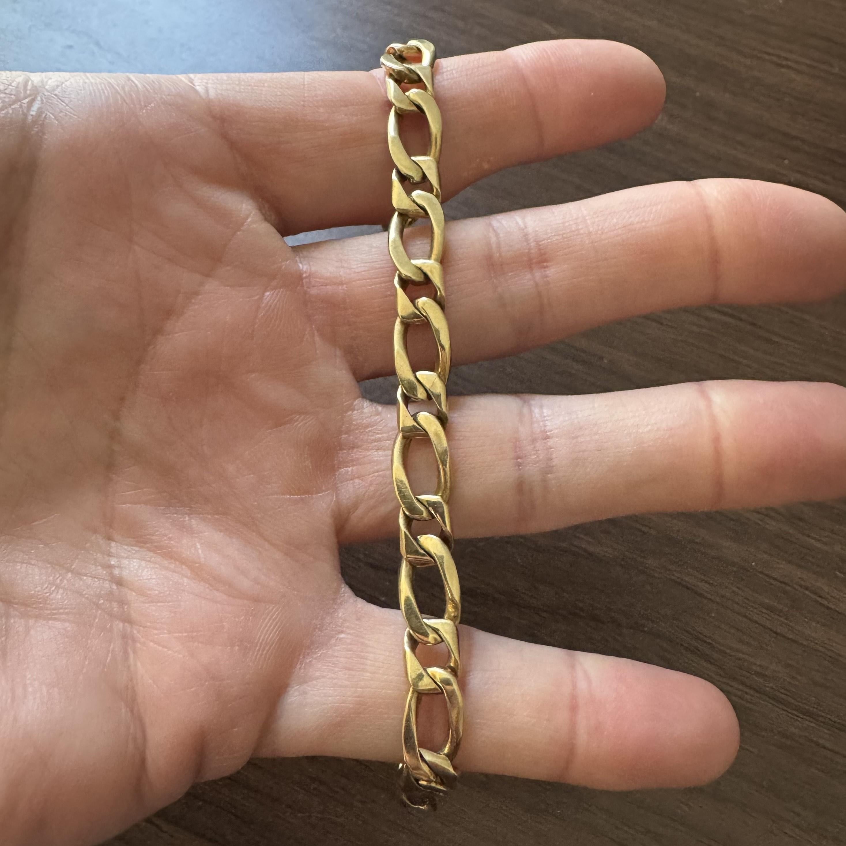 Condition:  Excellent Condition, Professionally Cleaned and Polished
Metal:  14k Gold (Marked, and Professionally Tested)
Weight:  27.6g
Length:  8.25 Inches
Width:  8mm
Closure:  Box Tab Insert with Safety Latch
Markings:  