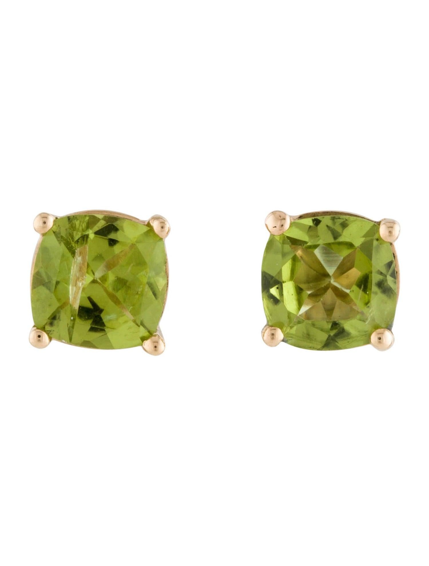 Elevate your style with our stunning 14K Yellow Gold Peridot Stud Earrings, featuring 2.78 carats of cushion modified brilliant peridots. These exquisite earrings shine with a vibrant green hue, encapsulating the essence of elegance and