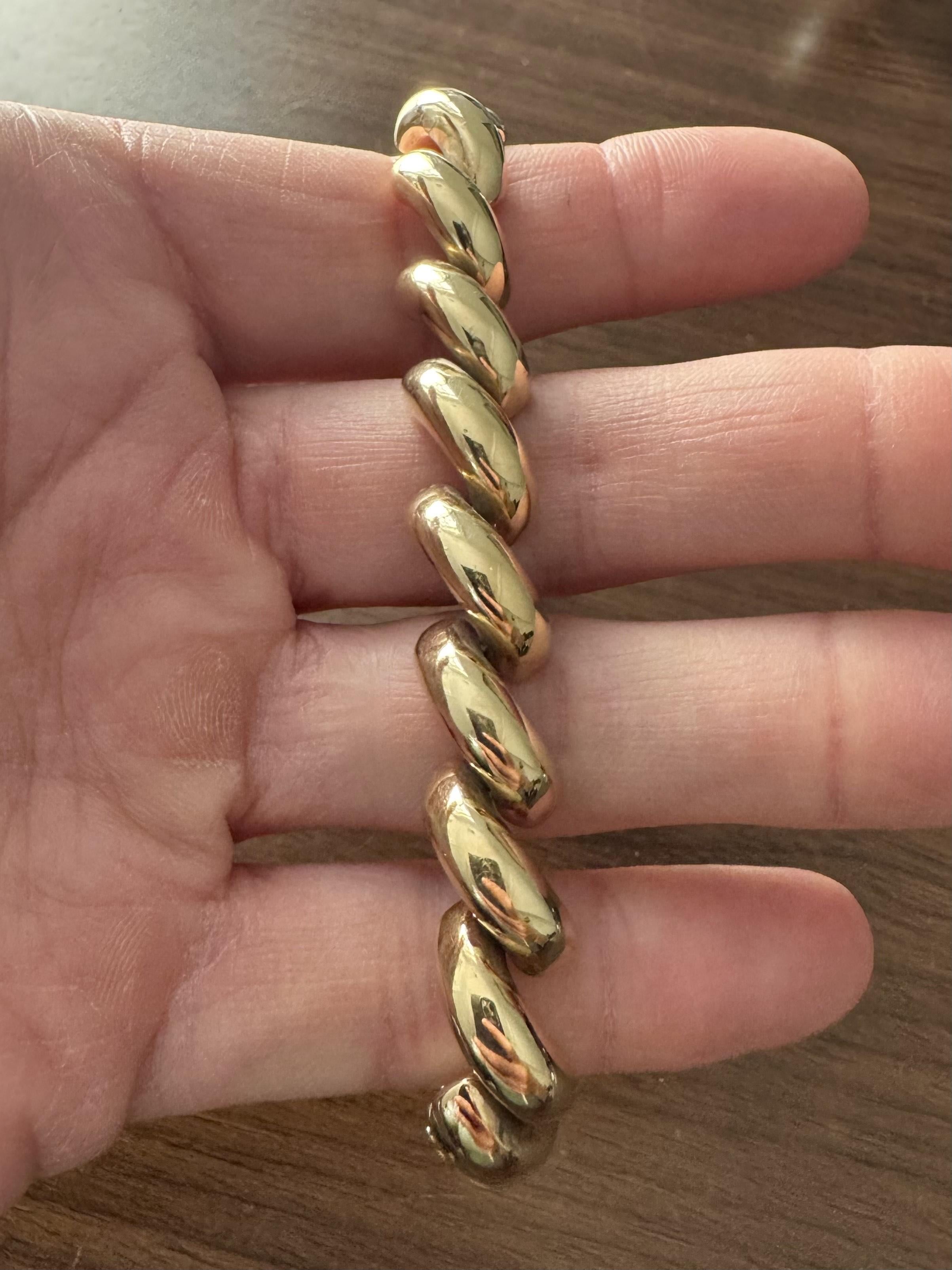 Condition:  Excellent Condition, Professionally Cleaned and Polished
Metal:  14k Gold (Marked, and Professionally Tested)
Weight:  28.3g
Length:  7.5 Inches
Width:  12mm
Closure: Box Tab Insert with Safety Latch
Markings:  