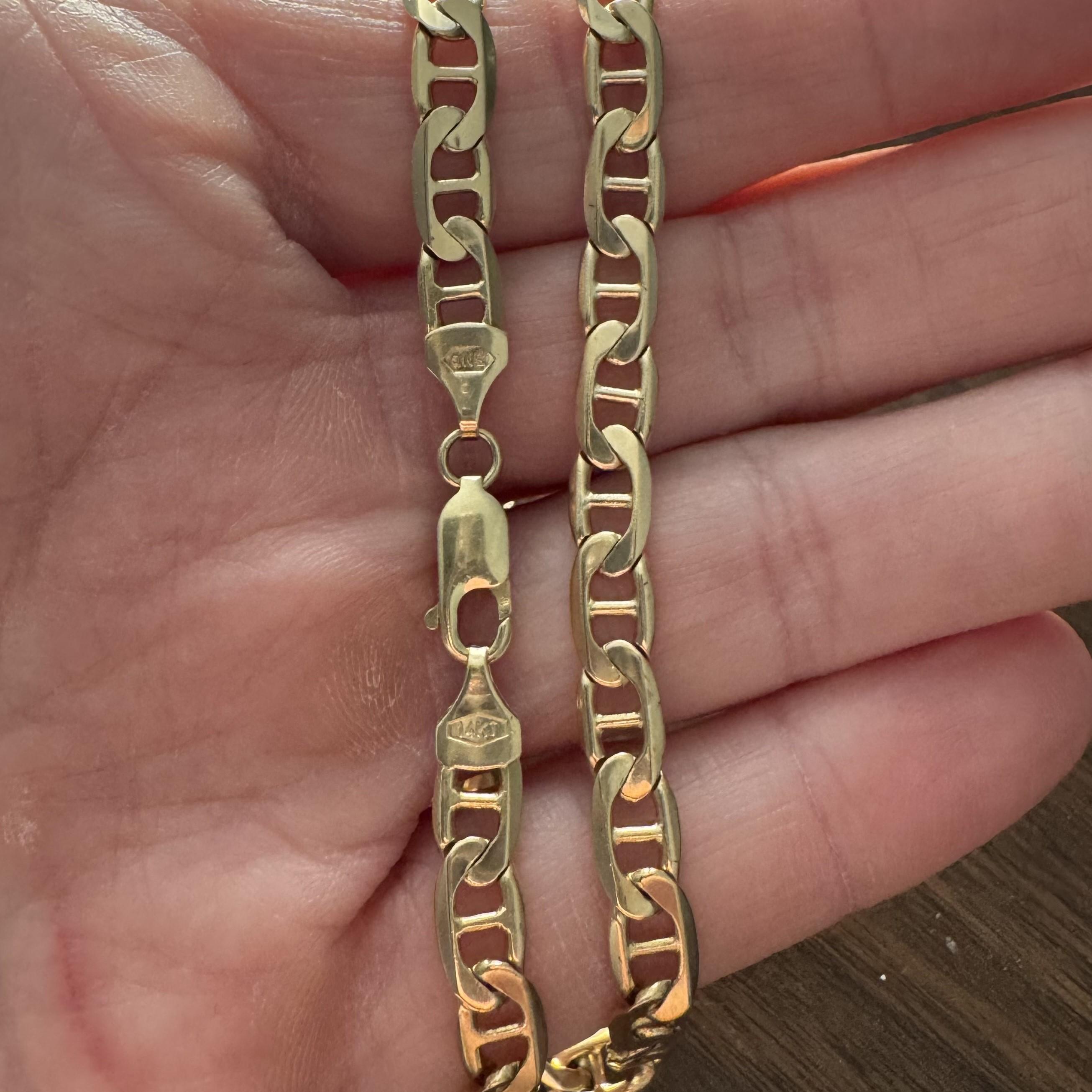 Condition:  Excellent Condition, Professionally Cleaned and Polished
Metal:  14k Gold (Marked, and Professionally Tested)
Weight:  29.4g
Length:  20 Inches
Width:  6mm
Closure:  Lobster Claw
Markings:  