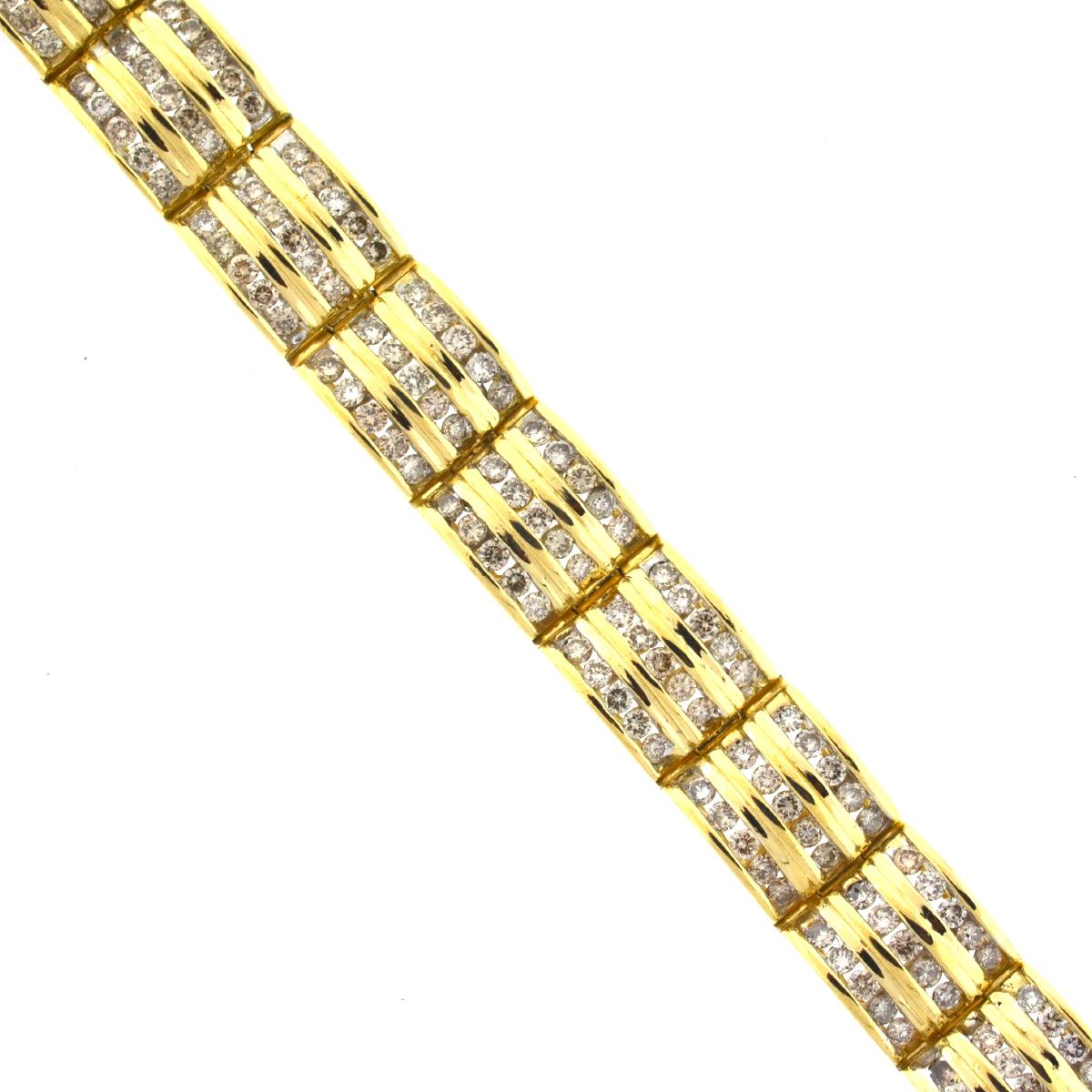 Style - 3 Row Diamond Bracelet
Metal - 14k Yellow Gold
Stones - 300 Round Diamonds, Approx. 3.0 cts. tw
Size - 7