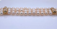14 Karat Yellow Gold 3 Strand Pearl Bracelet with Diamond Detail