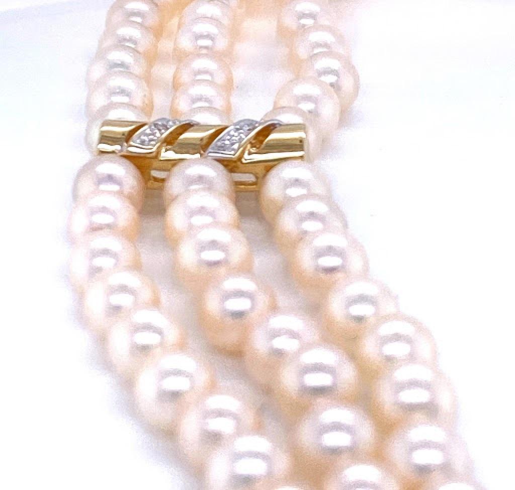 Contemporary 14 Karat Yellow Gold 3 Strand Pearl Bracelet with Diamond Detail
