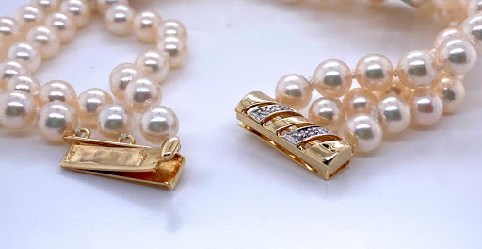 Round Cut 14 Karat Yellow Gold 3 Strand Pearl Bracelet with Diamond Detail