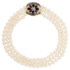 14K Yellow Gold 3 Strand Pearl Necklace with a Diamond, Ruby and Sapphire Clasp