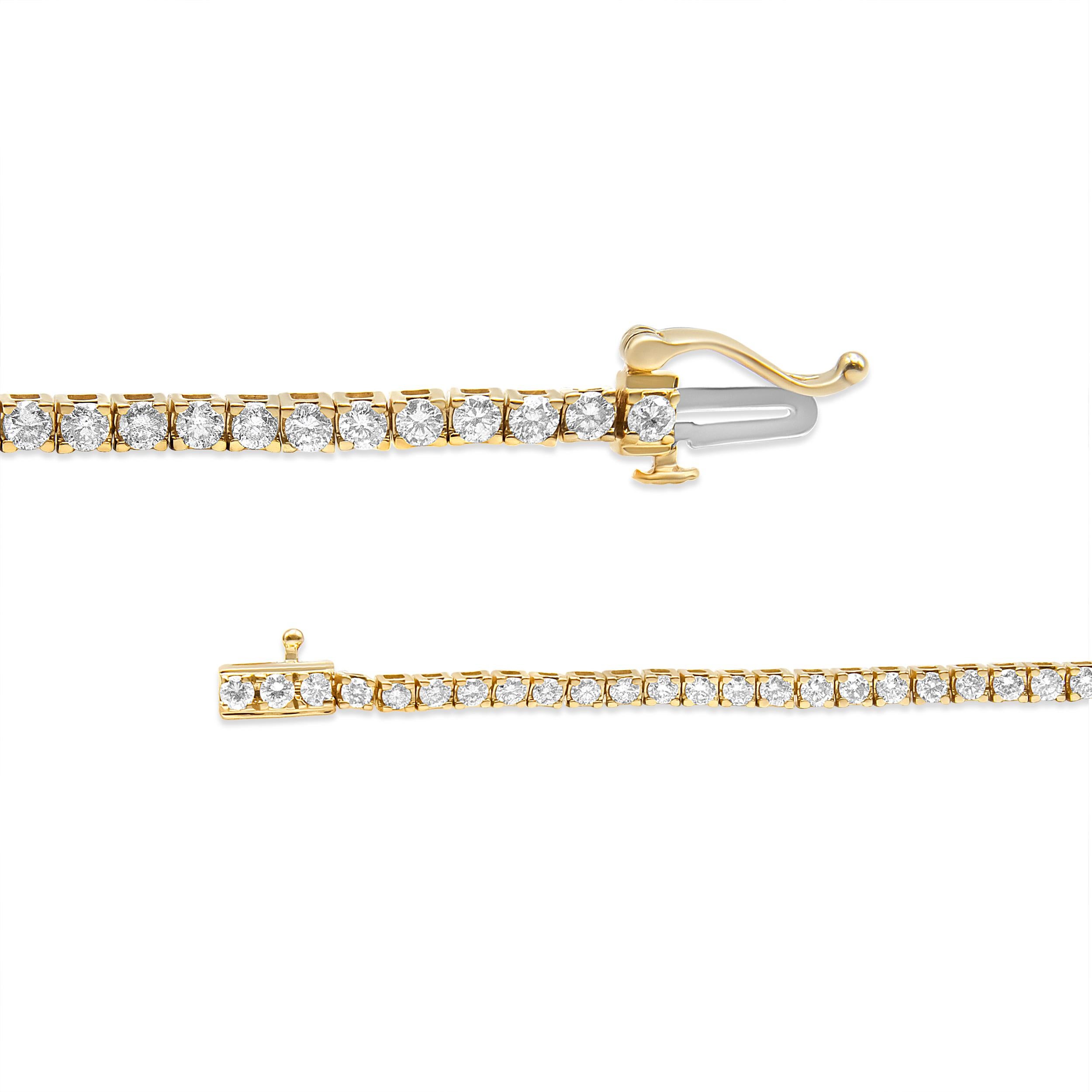 Can’t get enough of tennis bracelets? Here’s one that should be on your radar. Instead of the usual white gold bracelet, this piece starts with a 14K yellow gold base that beautifully contrasts against the natural round diamonds. The 69 round,