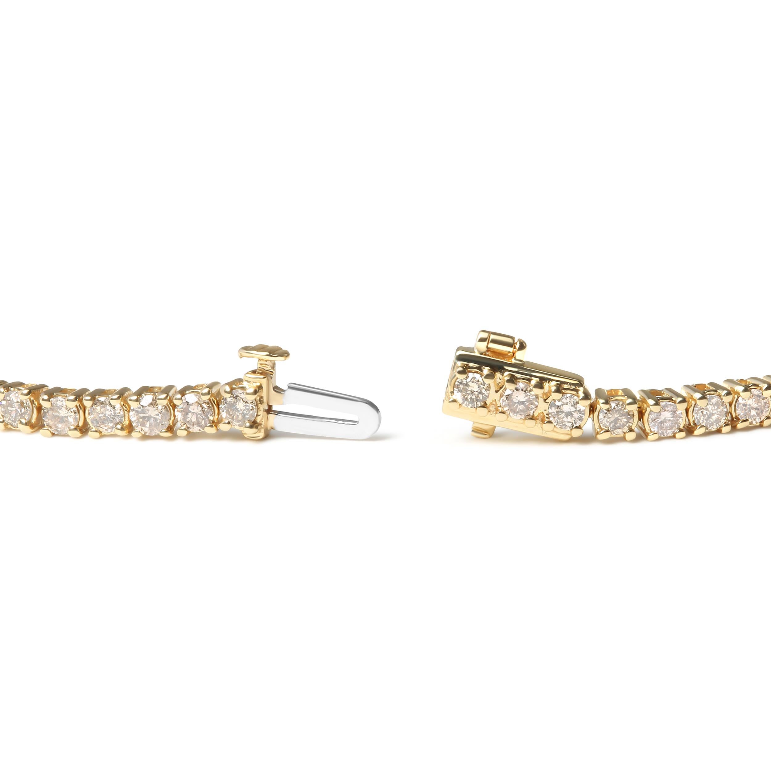 Introducing our stunning 14K yellow gold 3.00 Cttw round brilliant-cut diamond tennis bracelet! This piece features a beautiful array of 65 natural diamonds, totaling 3.0 Carats, all perfectly prong-set to create a stunning and continuous sparkle on