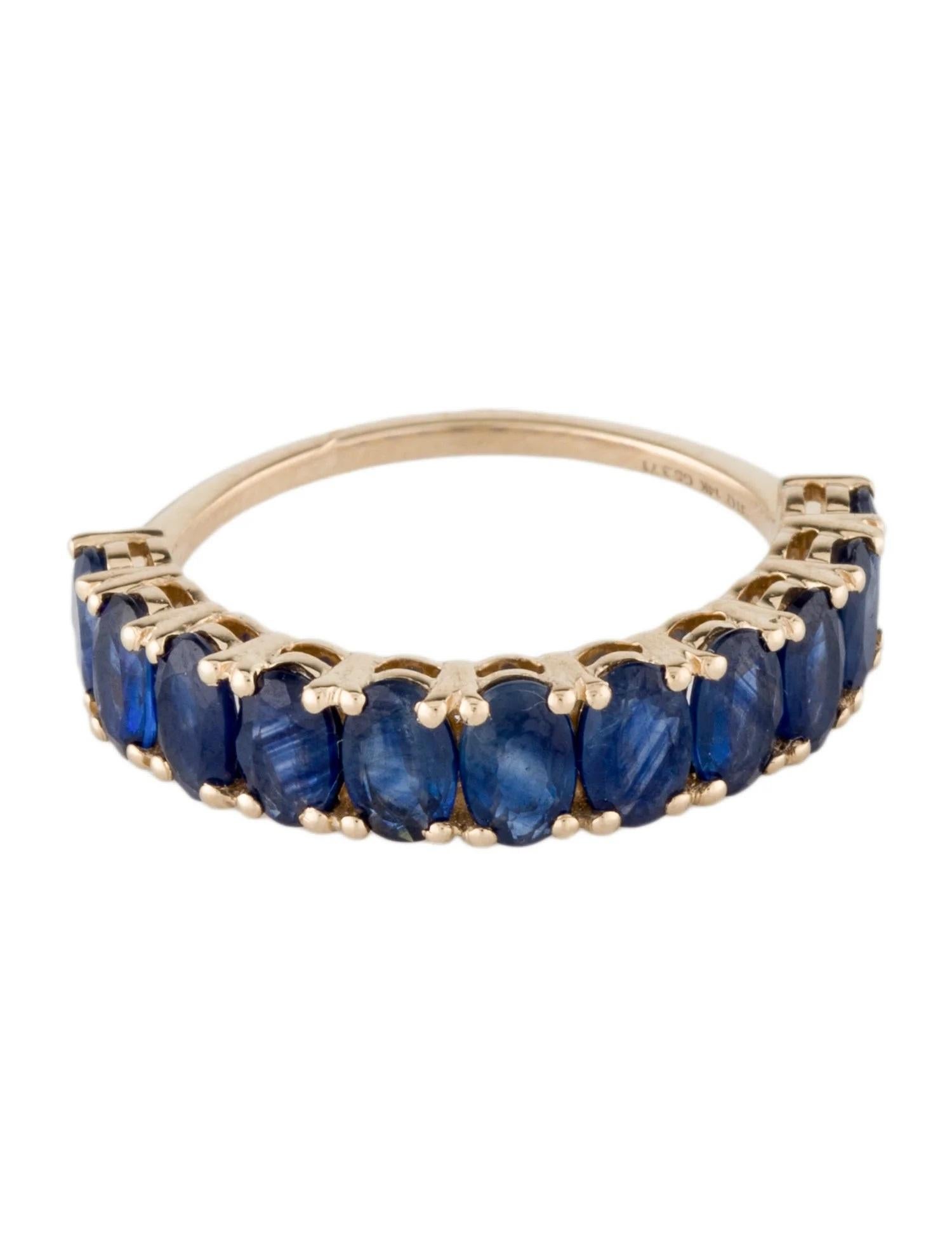 Artist 14K Yellow Gold 3.04 Carat Total Weight Oval Sapphire Band Ring Featuring 11 Fac For Sale