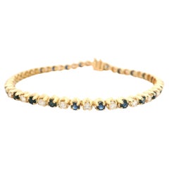 Bracciale tennis in oro giallo 14k con linea alternata di diamanti e zaffiri da 3,25 carati
