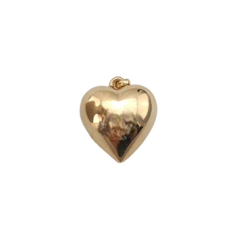 14K Yellow Gold 3D Puffy Heart Pendant 

Simple 3D heart pendant in 14K yellow gold.

Hallmark: 14KT RAB

Weight: 2.05 dwt/ 3.19 g

Length w/ bail: 25.25 mm

Size: 21.20 mm X 18.9 mm X 12.72 mm

Very good condition, professionally polished.

Will