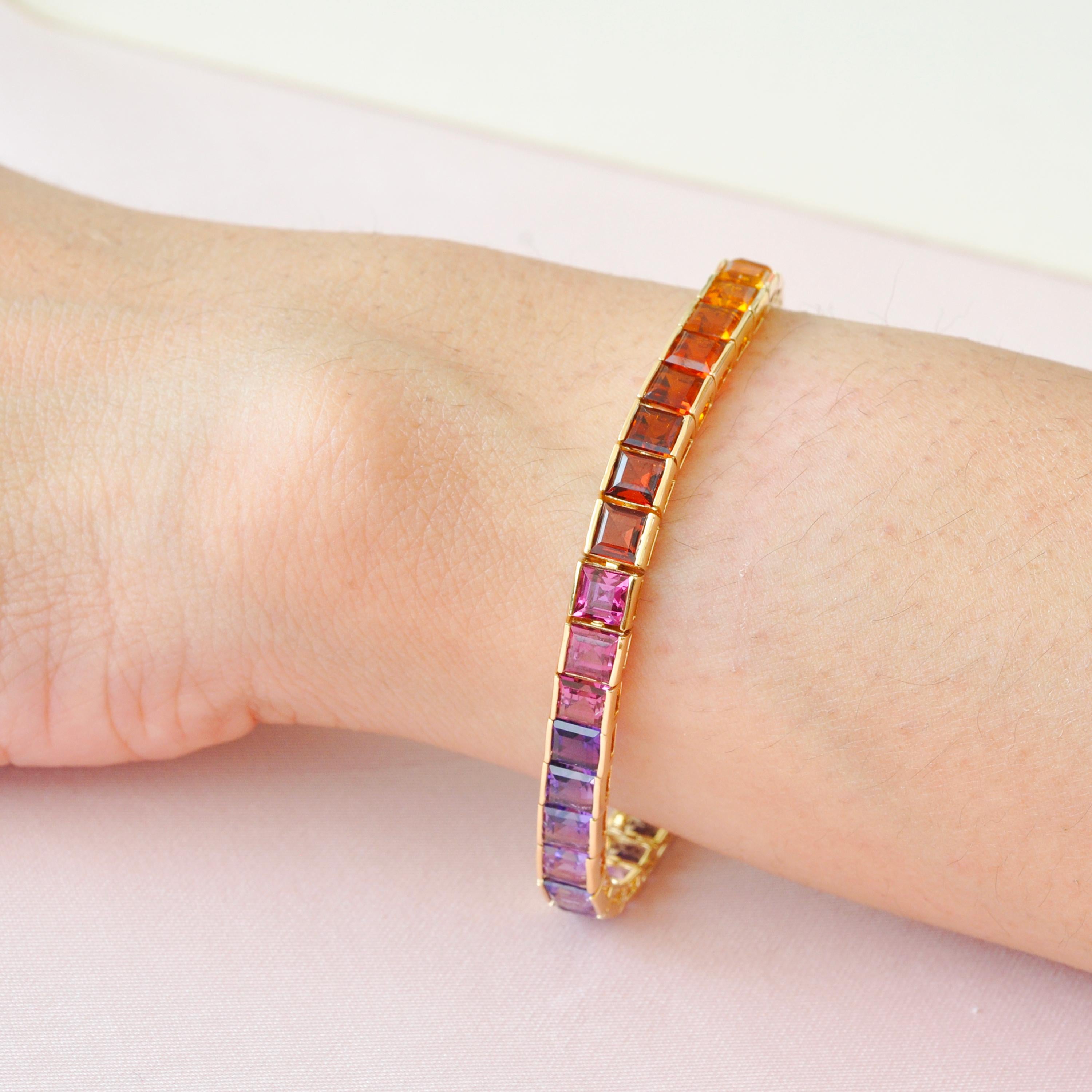 Bracciale tennis pride in oro 14 carati da 4 mm con gemme naturali multicolore.

Questo braccialetto tennis con gemme multicolore arcobaleno, elegante e di classe, è eterno. Il braccialetto tennis con gemme naturali multicolore di forma quadrata da
