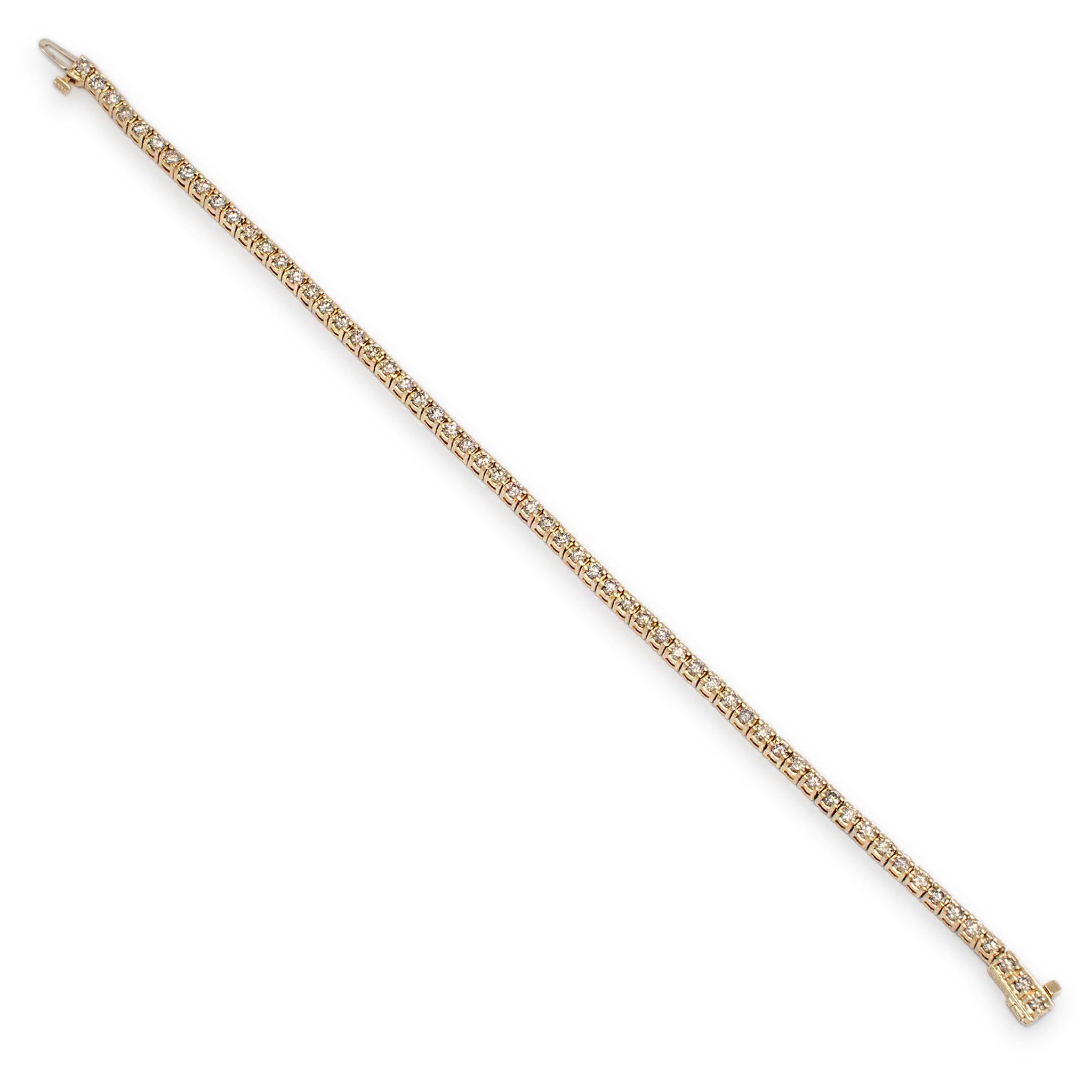 Metal Type: 14k Yellow Gold

Length: 8.00 inches

Width: 3.30 mm

Weight: 14.87 grams

14K yellow gold diamond tennis bracelet. The metal was tested and determined to be 14K yellow gold. Engraved with 