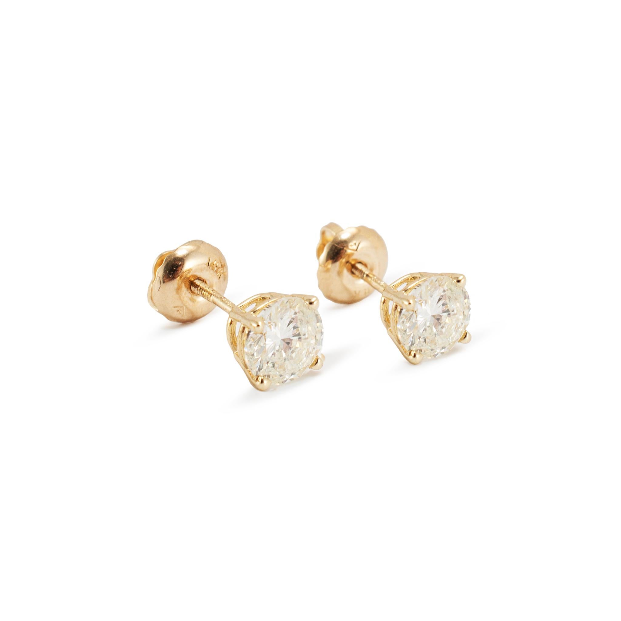 Taille ronde Boucles d'oreilles en or jaune 14K à 4 branches vissées avec 1.03ct de diamant en vente