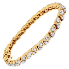 Bracciale con diamanti taglio rotondo in oro giallo 14K da 4,0 carati