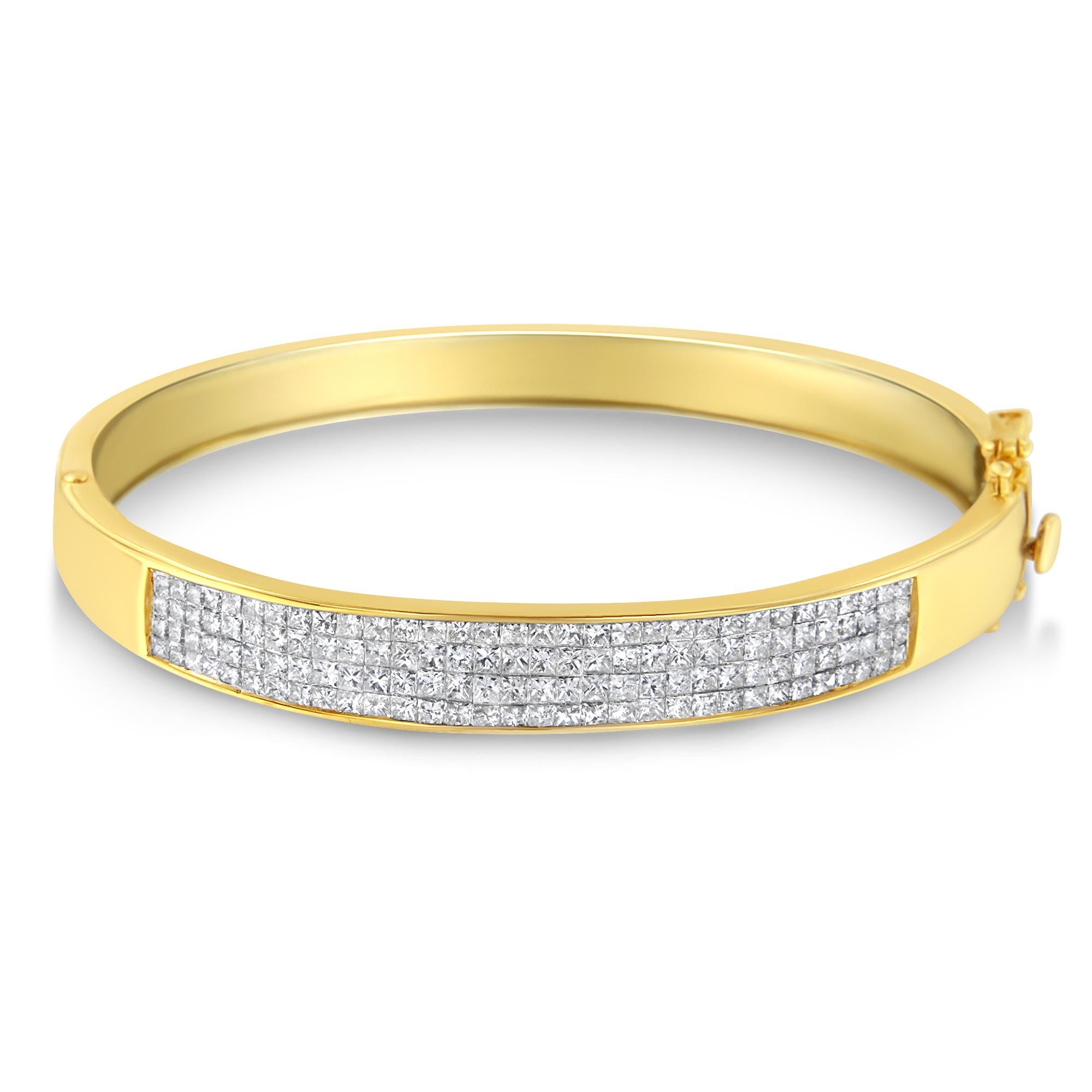 The richness and glory of this 4.0 Cttw diamond bracelet make it a perfect statement bangle for every woman. The beautiful princess cut diamonds are set on pure 14 karat gold. This bangle is lightweight, weighing just 18gm, so you can wear it for