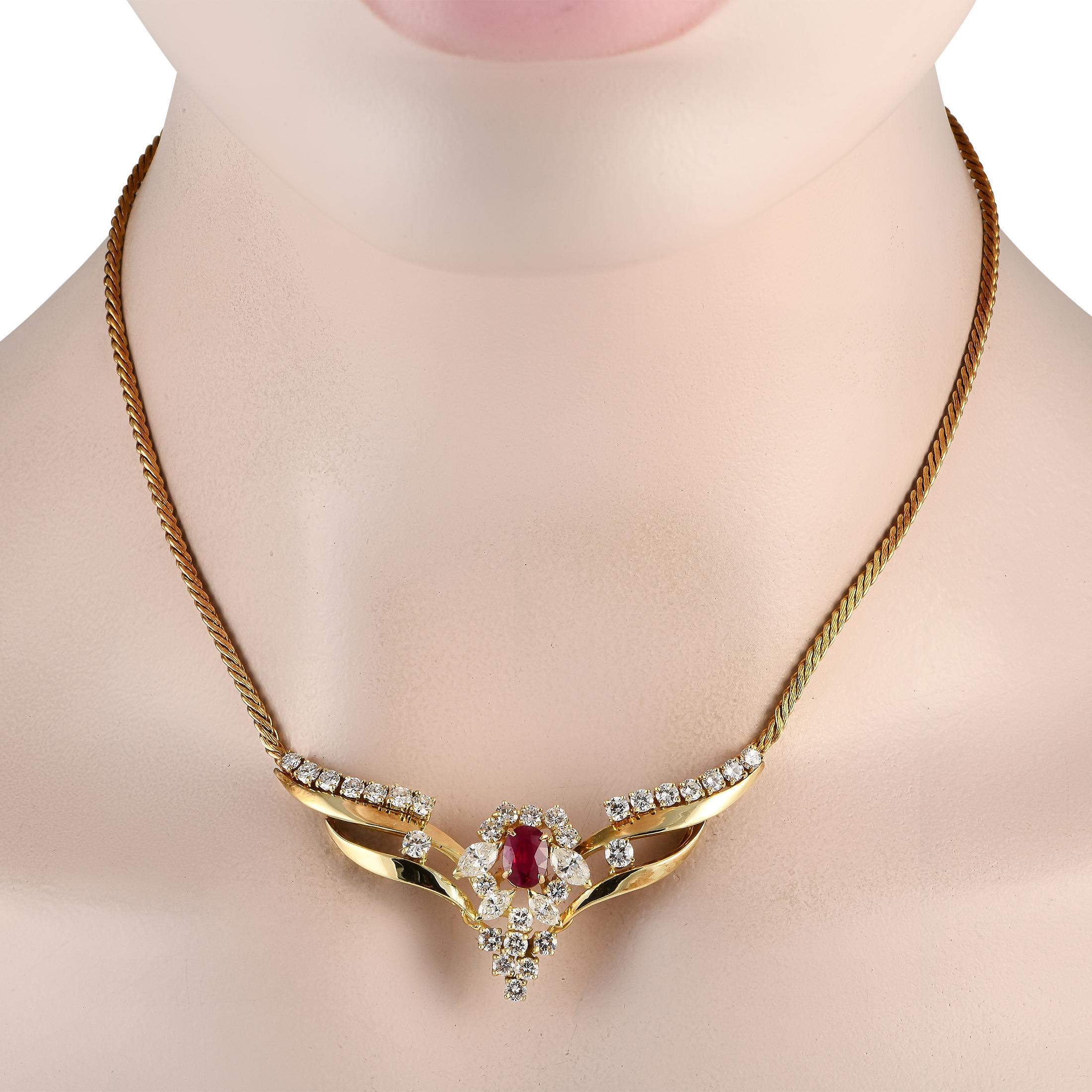 This exquisite necklace is poised to continually make a statement. At the center of the sleek 14.15 chain, youll find an intricate central pendant crafted from opulent 14K Yellow Gold. Diamond accents with a total weight of 4.0 carats provide plenty