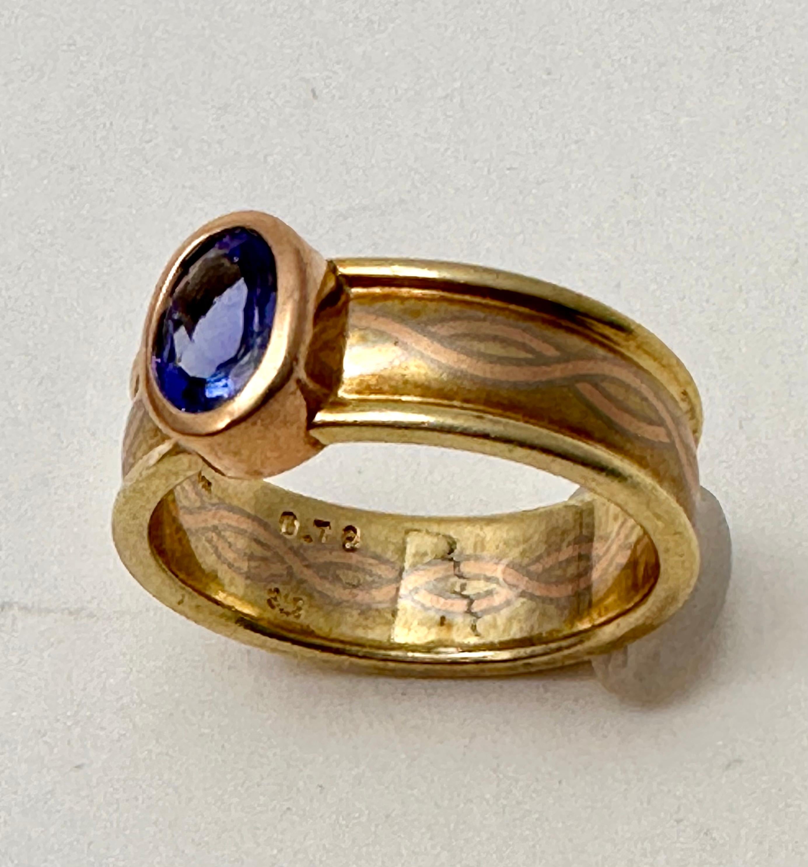 14k Yellow Gold 4.5mm x 6.5 Oval Cut Tanzanite Ring Size 7 For Sale 4