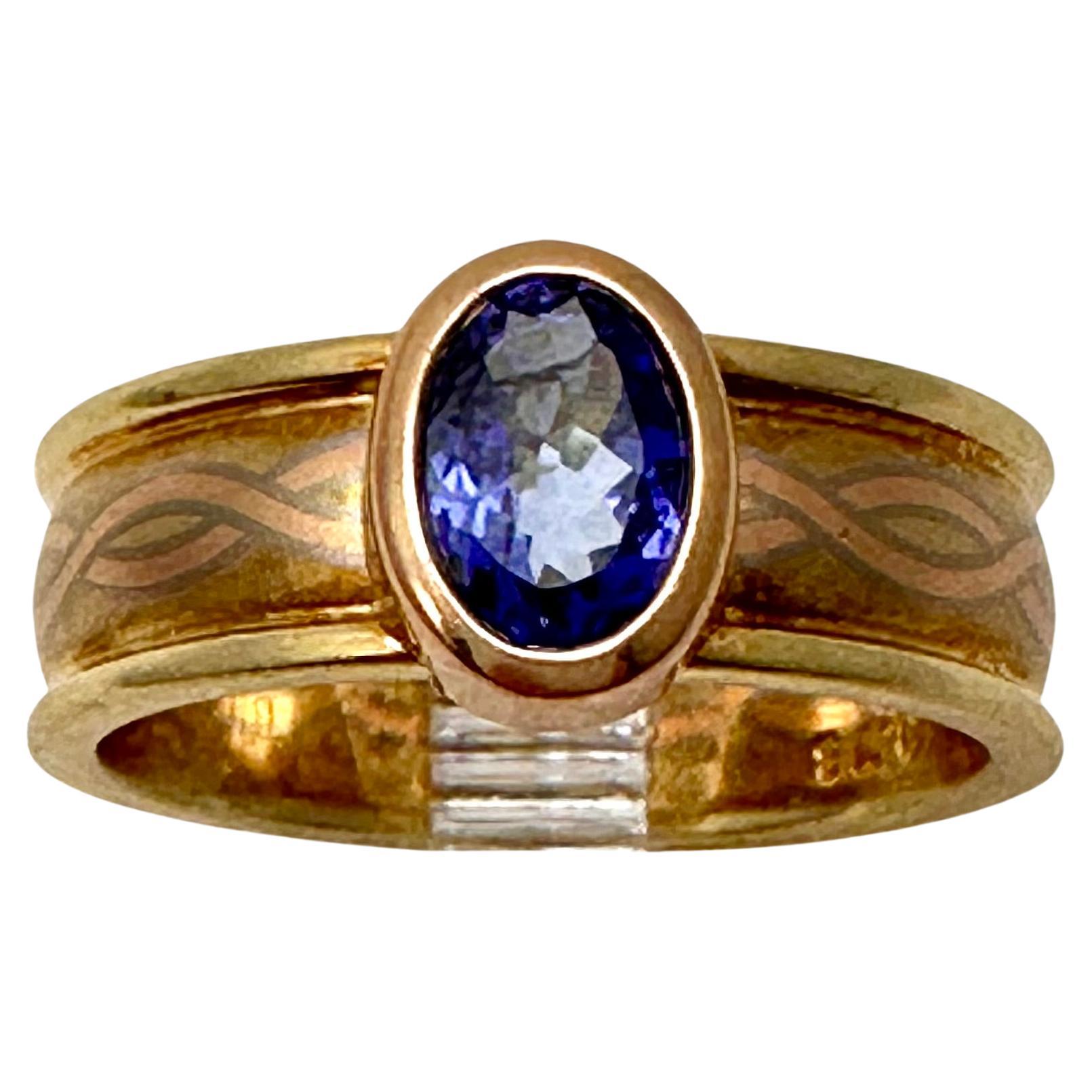 14k Yellow Gold 4.5mm x 6.5 Oval Cut Tanzanite Ring Size 7 For Sale