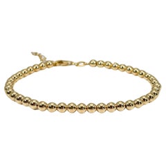 Bracelet perlé de 4 mm en or jaune 14 carats