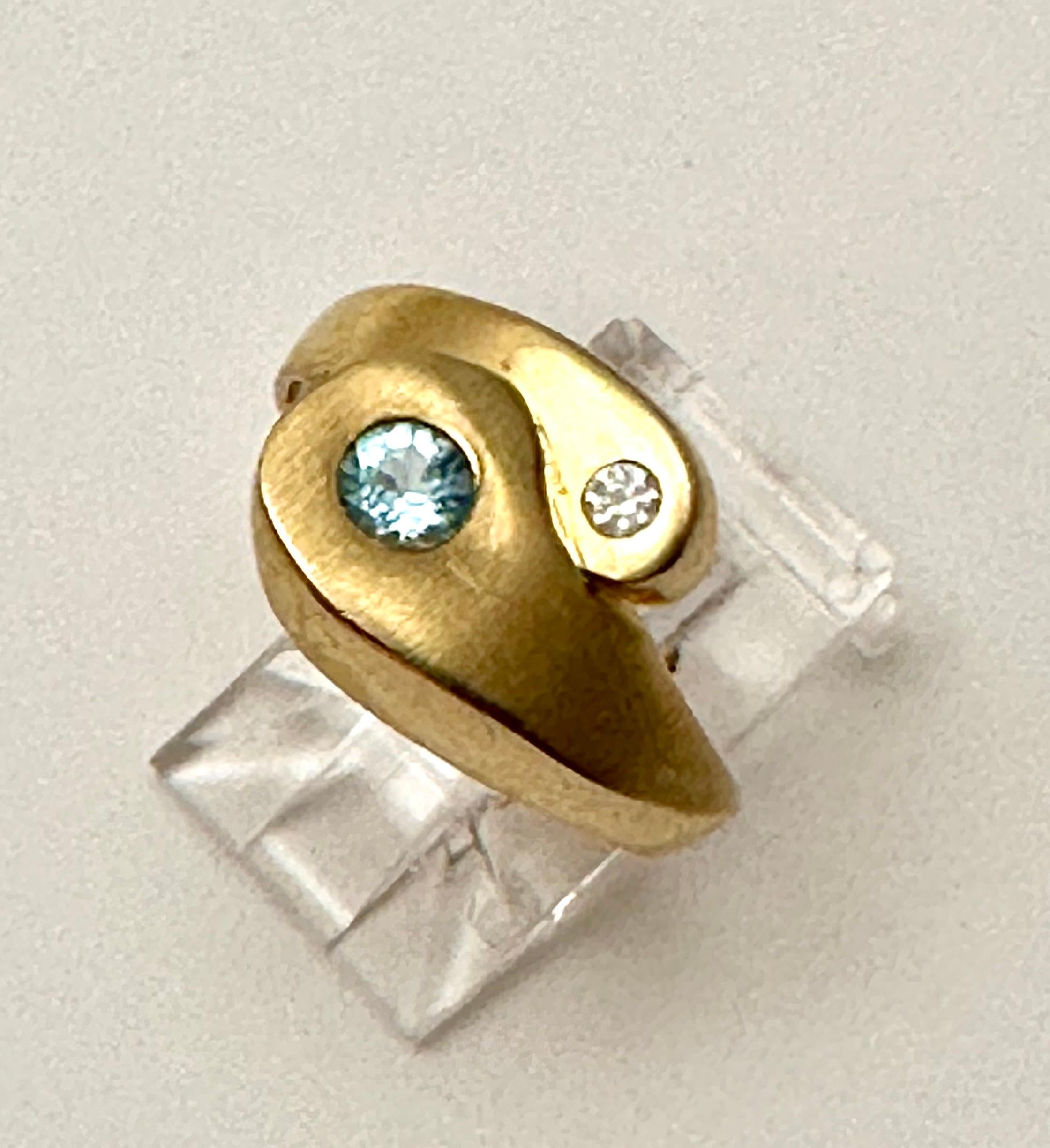 Modern 14k Yellow Gold  4mm Round Blue Topaz 2.2mm Round Diamond Ring Size 8 For Sale