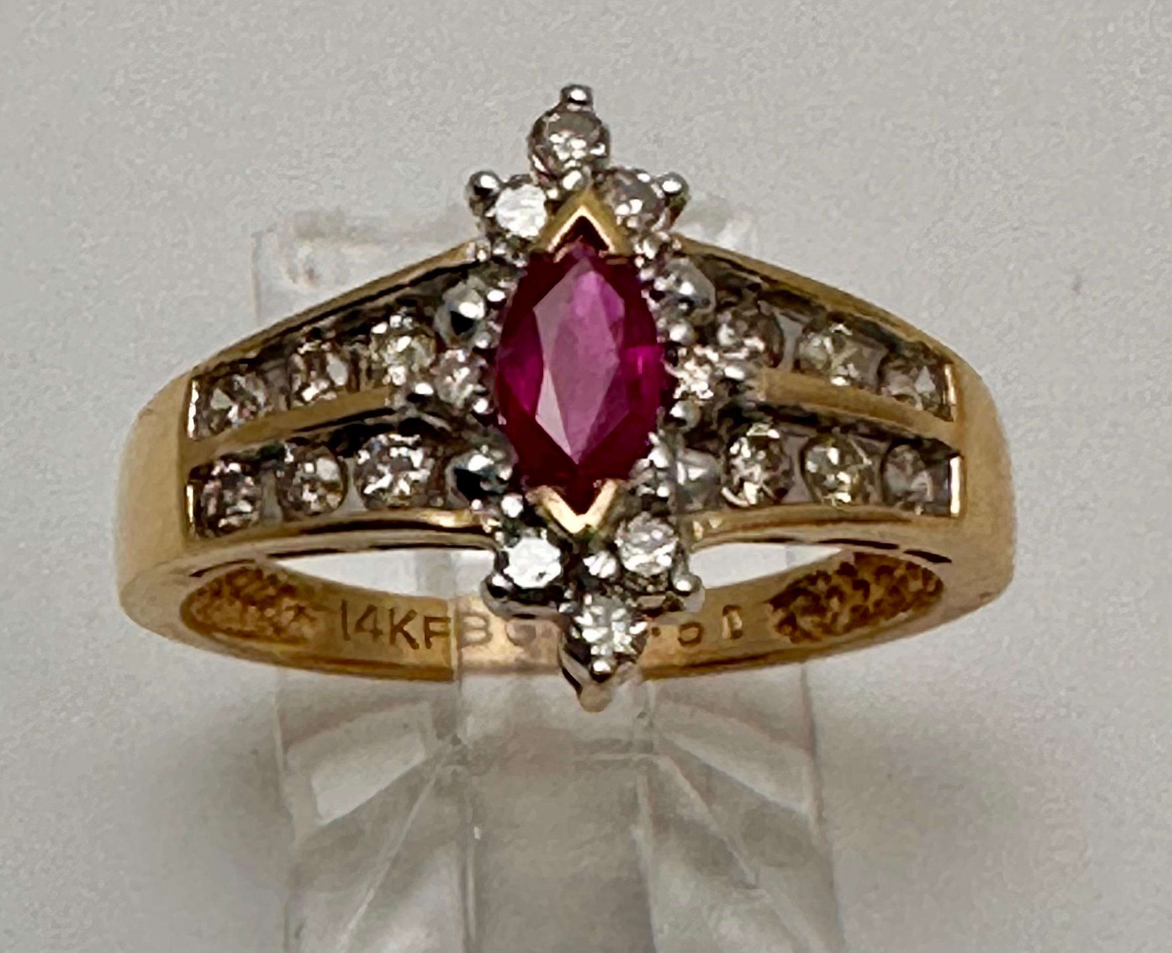 14k Yellow Gold approx. 4mm x 6mm Marquise Ruby .with .50tcw Diamonds Ring Size 7 1/2

Add a touch of elegance to your jewelry collection with this stunning 14k yellow gold ring featuring an approx  4mm x 6mm marquise ruby and .50c of diamonds. The