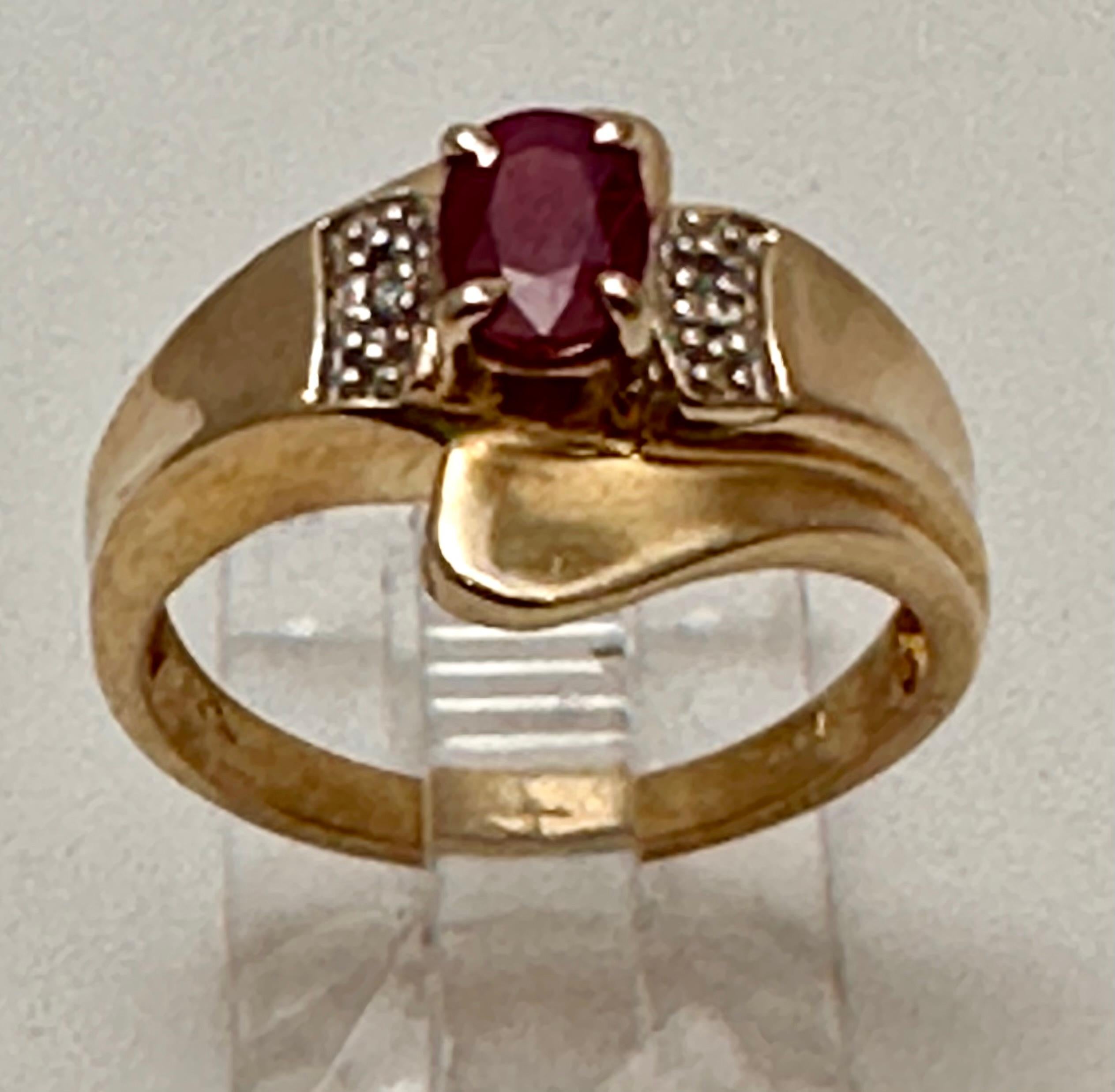 14k Yellow Gold 4mm x 6mm Oval Ruby 2 Side Diamond Ring Size 6

The ruby is known as a protective stone that can bring happiness and passion into the life of the wearer. Apart from its red color, this is why the ruby makes a perfect gift for a loved