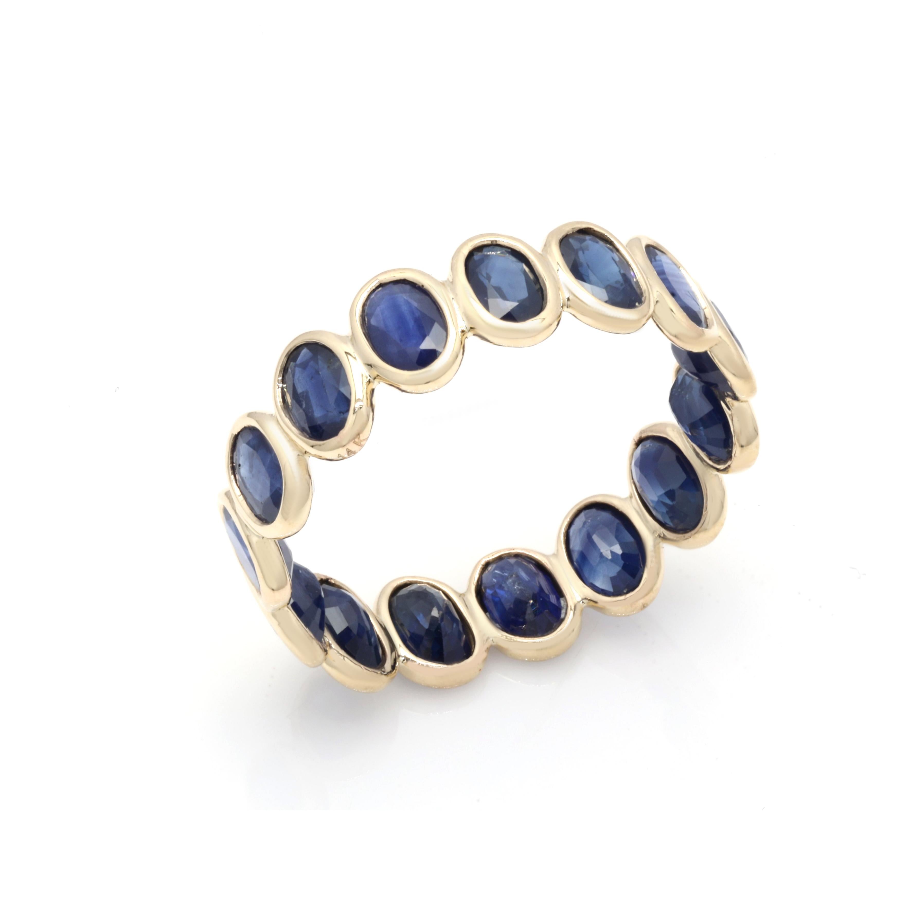 For Sale:  14K Yellow Gold 5 Carat Oval Cut Sapphire Eternity Band Ring 4