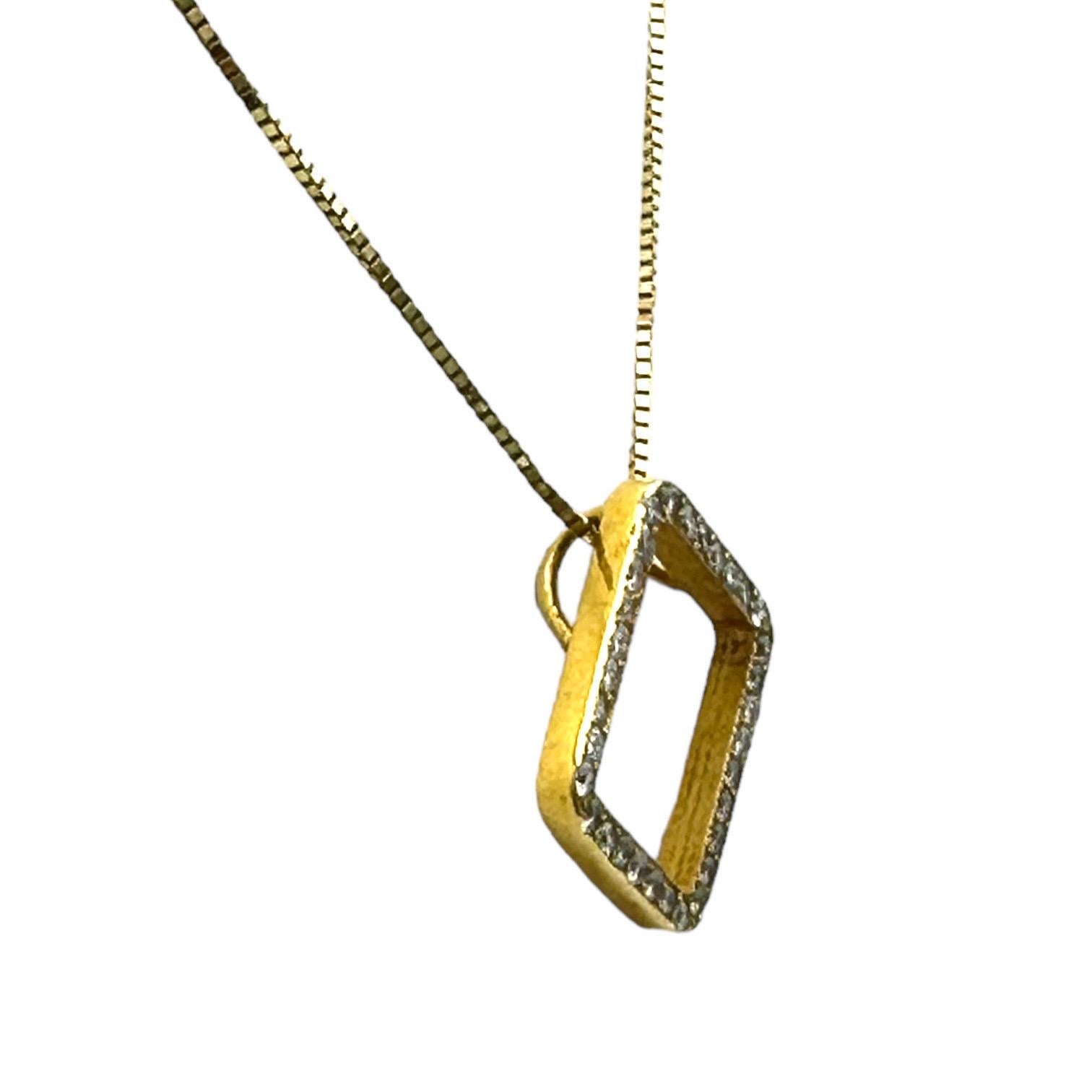 Make a statement with this elegant 14K Yellow Gold Halo Modern Sparkling Pendant and chain. The beautiful diamond halo pendant adds a layer of luster and sparkle to any look. This classic piece is the perfect way to celebrate a special occasion or