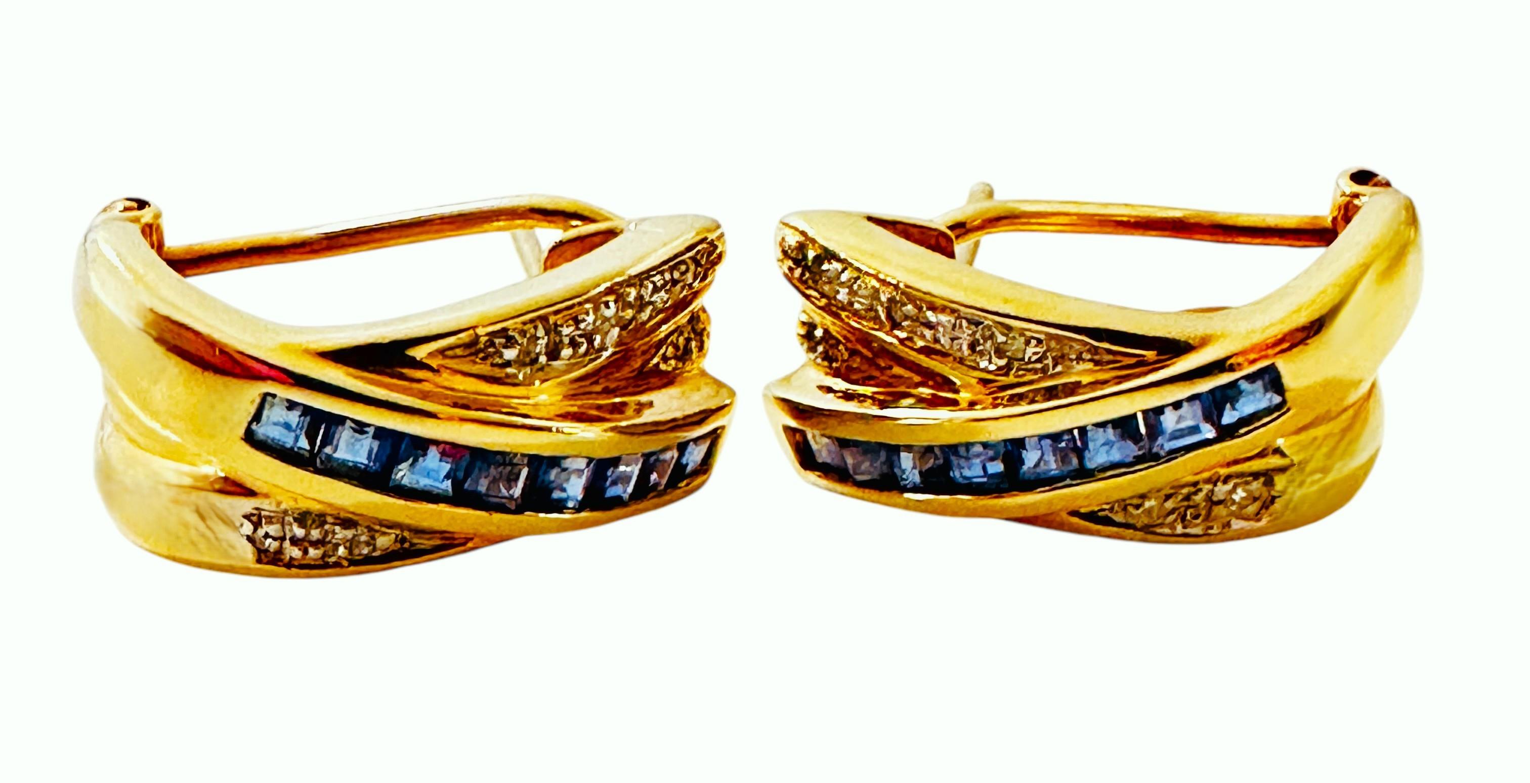 These earrings are just beautiful!  They are 14k yellow gold and each earrings has 8 Princess cut Sapphires .50 carats.  The measure 1.75 x 1.75.  They are flanked by small Brilliant Cut diamonds.  The earrings have an Omega Back and measure 18 mm