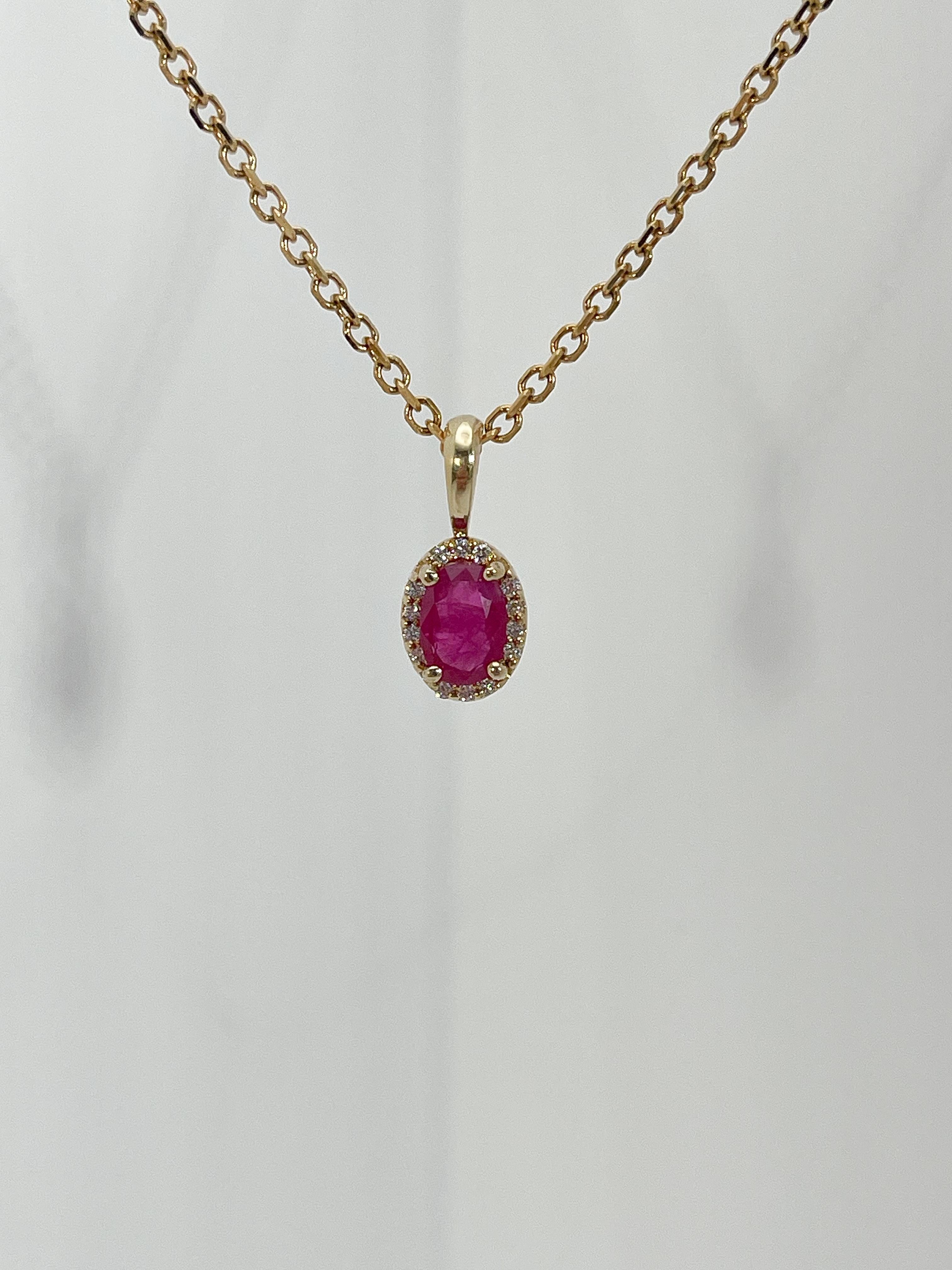 Oval Cut 14K Yellow Gold .50 CTW Ruby and Diamond Halo Pendant Necklace For Sale