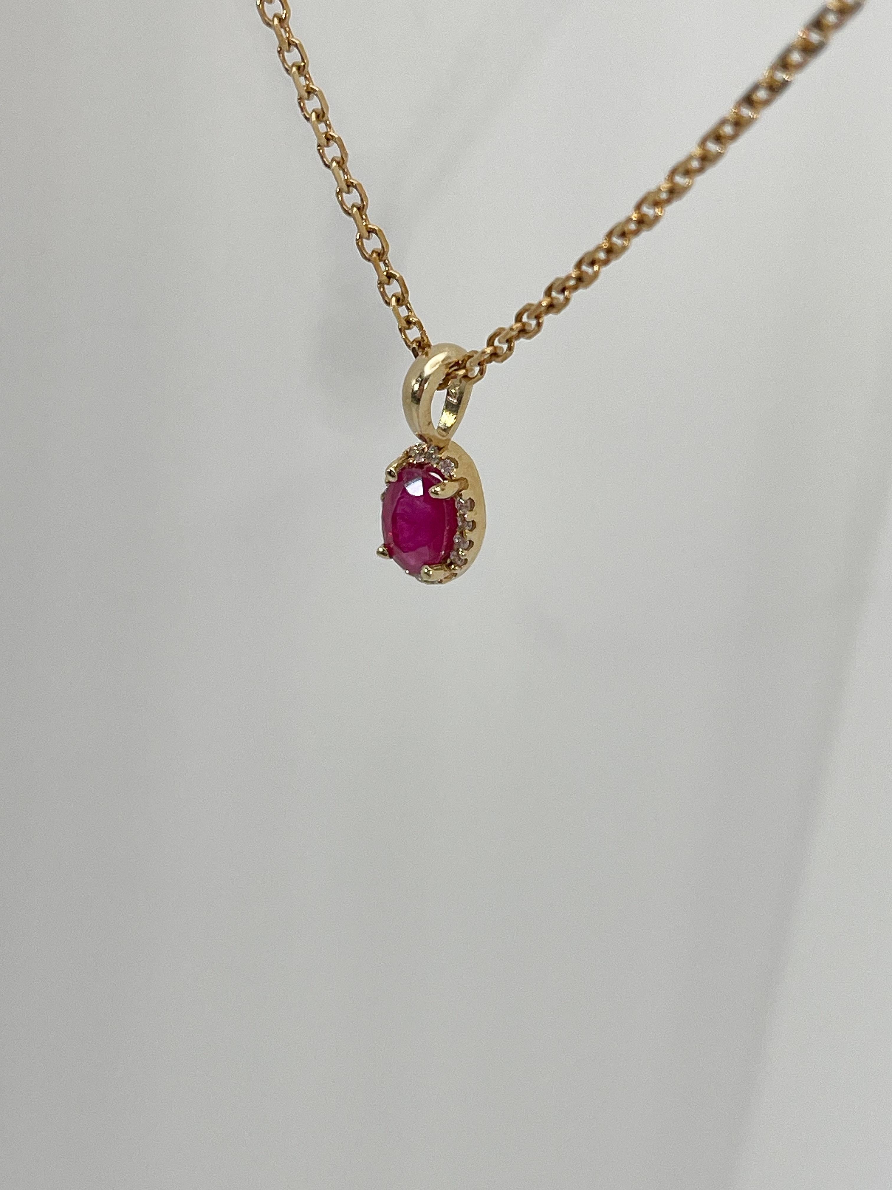 14K Yellow Gold .50 CTW Ruby and Diamond Halo Pendant Necklace In Good Condition For Sale In Stuart, FL