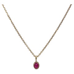 14K Yellow Gold .50 CTW Ruby and Diamond Halo Pendant Necklace