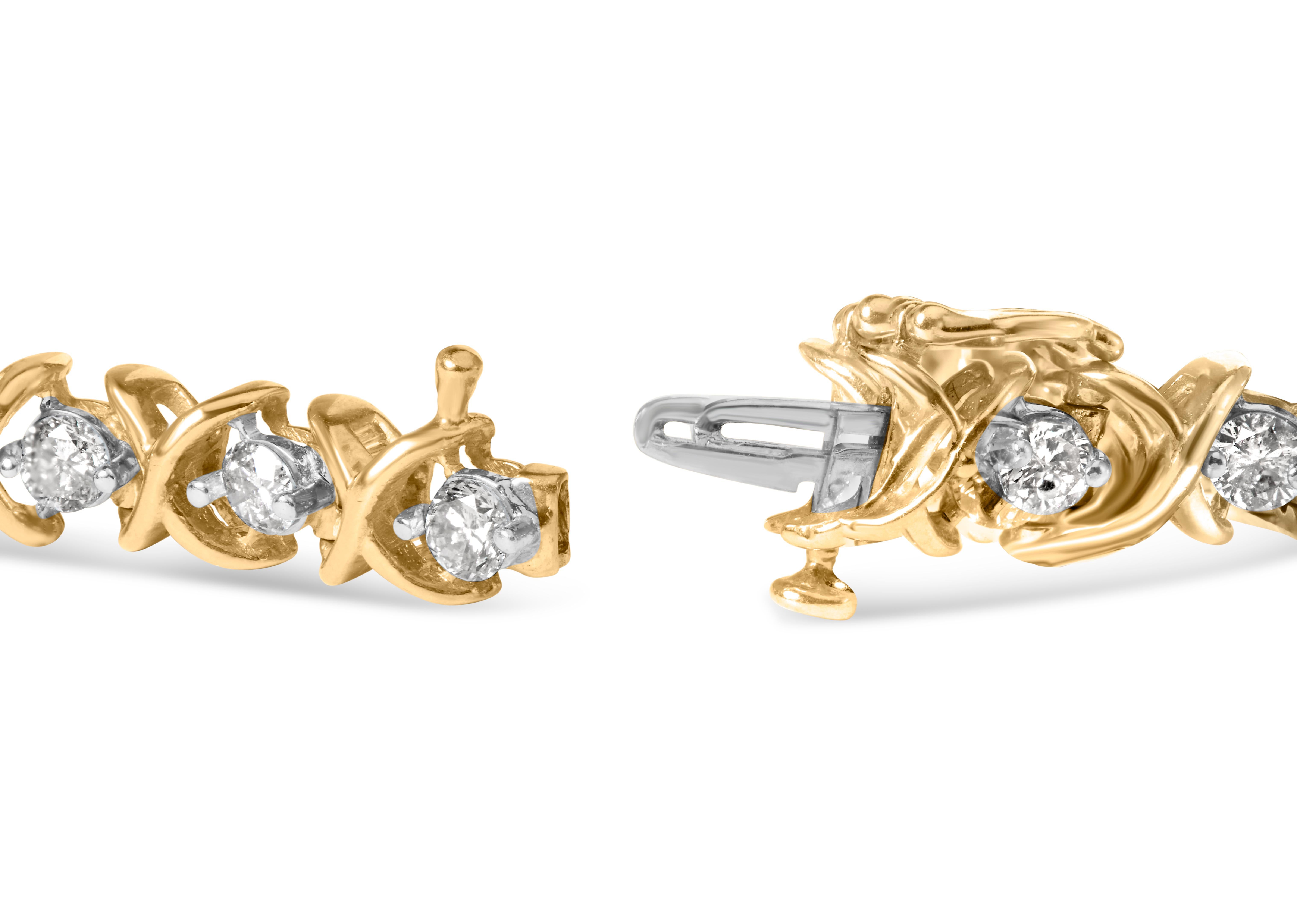 Voici un chef-d'œuvre éblouissant qui vous laissera bouche bée - un bracelet en or jaune 14 carats orné de diamants ronds d'une valeur de 5,00 ctw. Fabriqué avec la plus grande précision, ce bracelet présente un étonnant motif en X qui symbolise