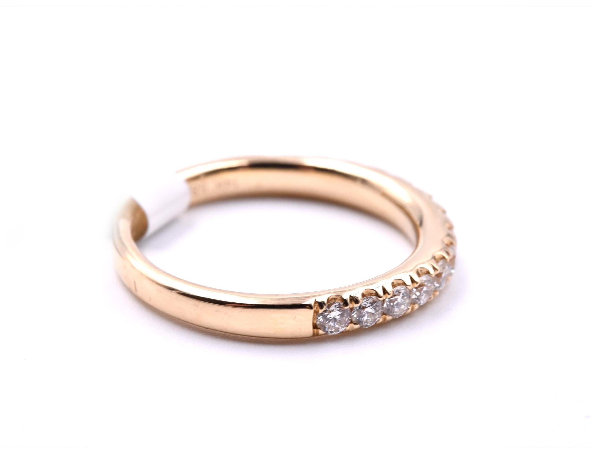 Designer: custom design
Material: 14k yellow gold
Diamonds: 15 round brilliant cut = .51cttw
Color: G
Clarity: VS
Ring size: 6 ½ (please allow two additional shipping days for sizing requests) 
Weight: 1.80 grams 
