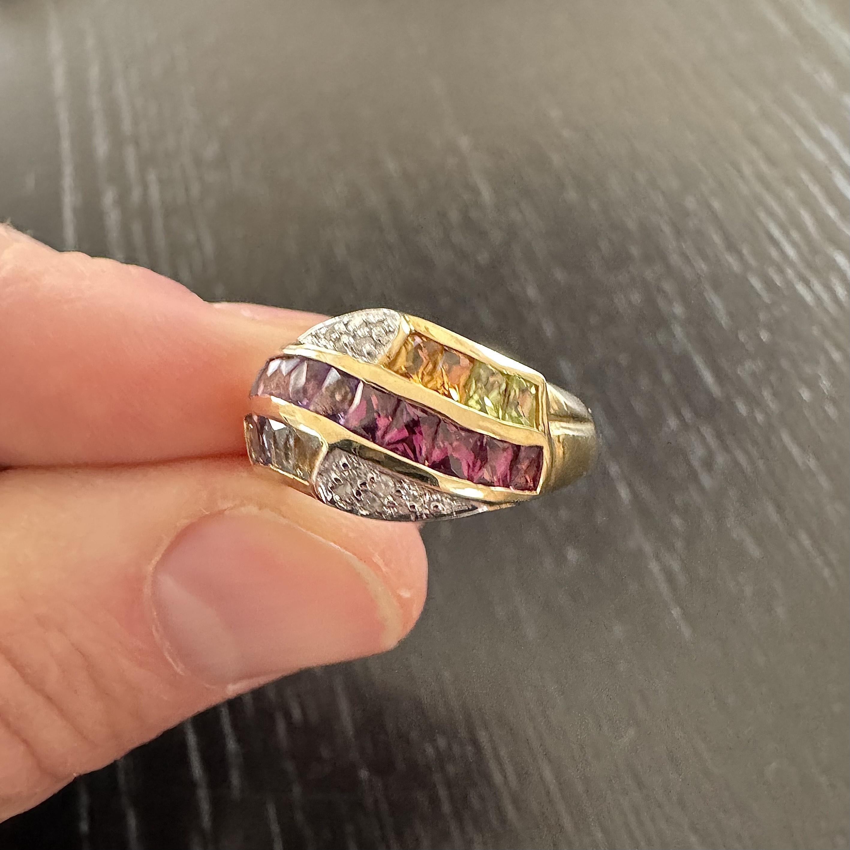 Condition:  Excellent Condition, Professionally Cleaned and Polished
Metal:  14k Gold (Marked, and Professionally Tested)
Weight:  5.5g
Gemstones:  Princess Cut Multi Gemstones
Diamonds:  Round Cut Natural Diamonds 0.05cttw
Width:  11mm at face, 2mm