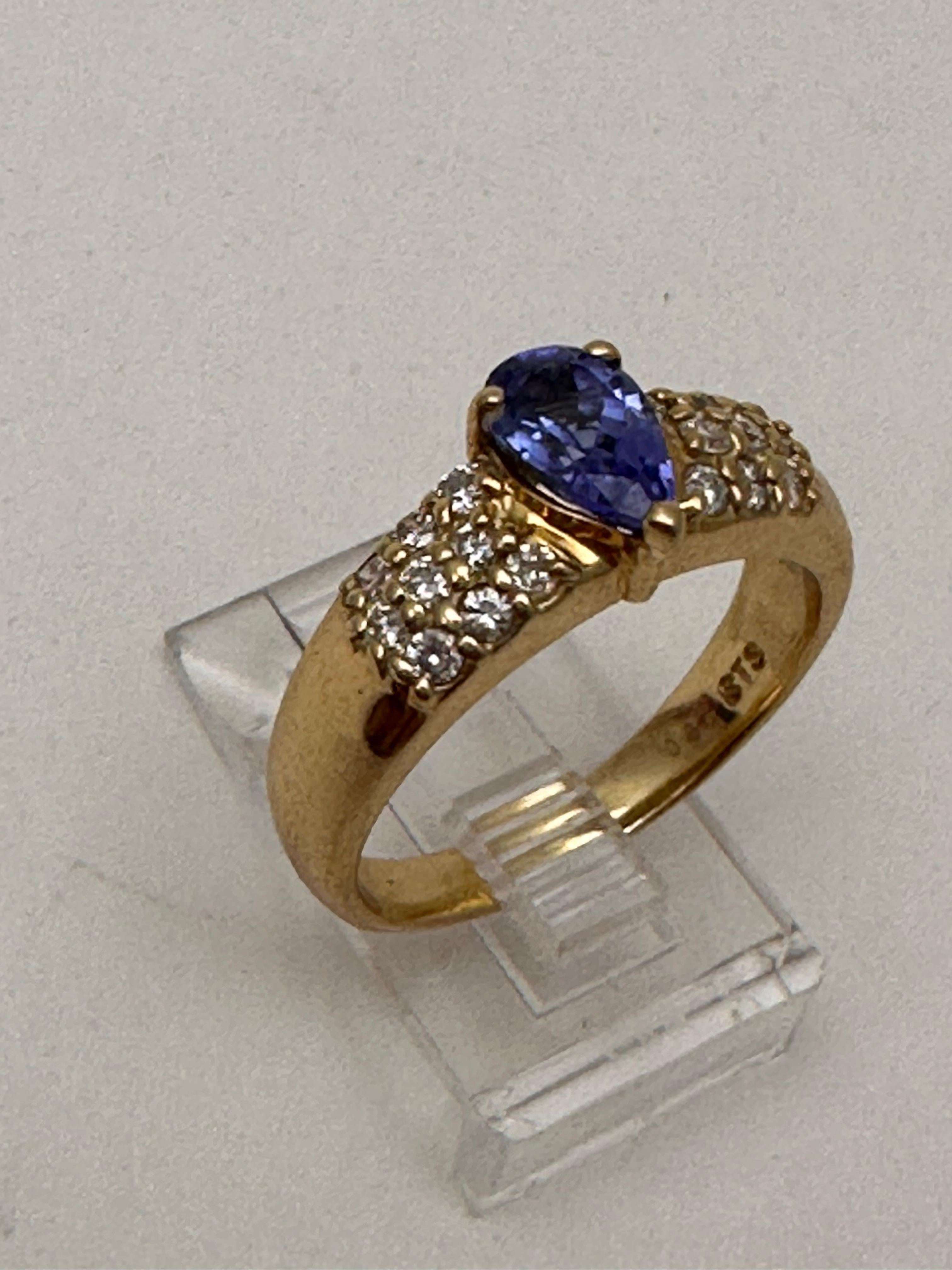 14k Yellow Gold 5.5mm x 8.5mm Pear Tanzanite 18 ~ Diamonds ~ Ring Size 7 1/2 In New Condition For Sale In Las Vegas, NV