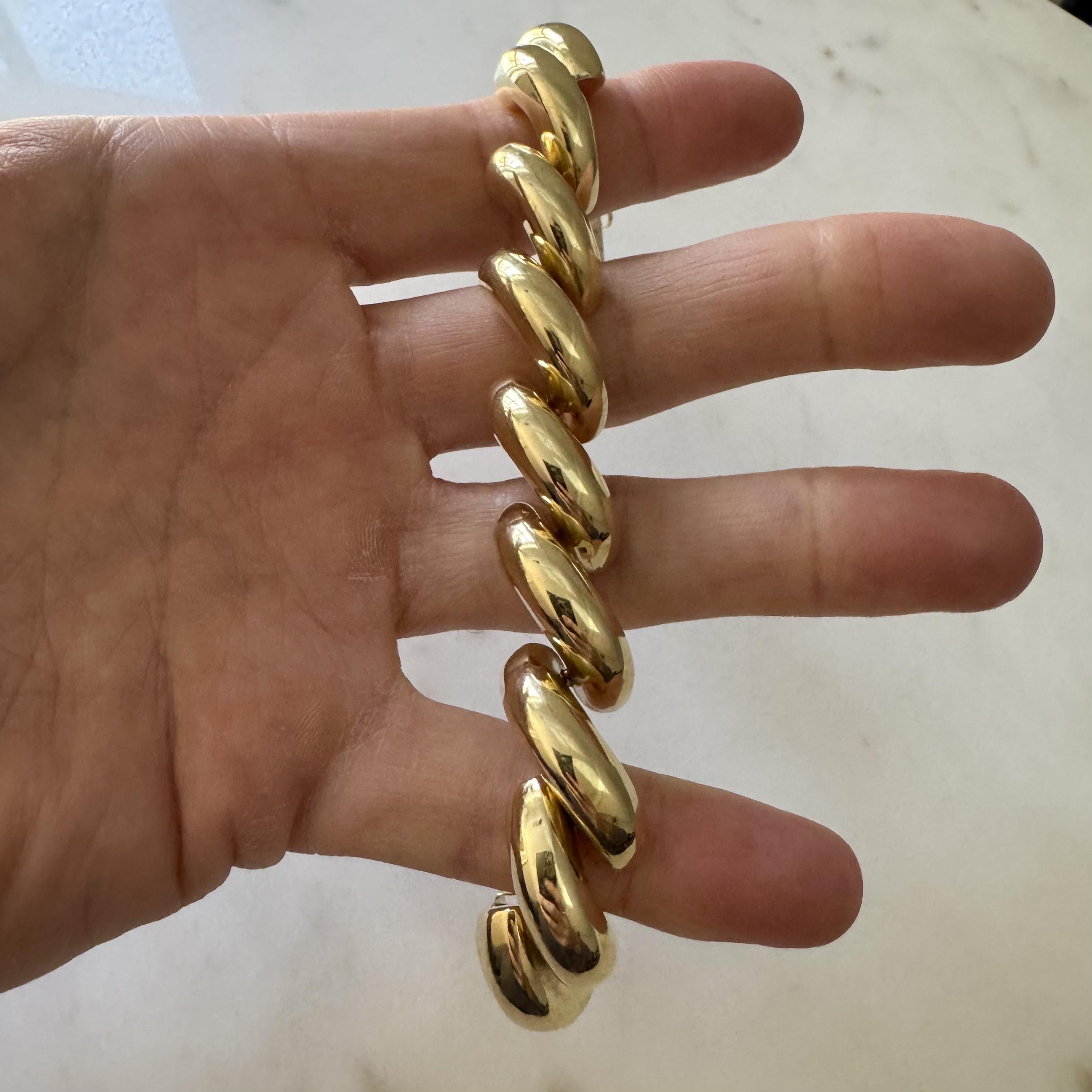Condition:  Excellent Condition, Professionally Cleaned and Polished
Metal:  14k Gold (Marked, and Professionally Tested)
Weight:  56g
Length:  7.25 Inches
Width:  16mm
Closure:  Box Tab Insert with Safety Latch
Markings:  