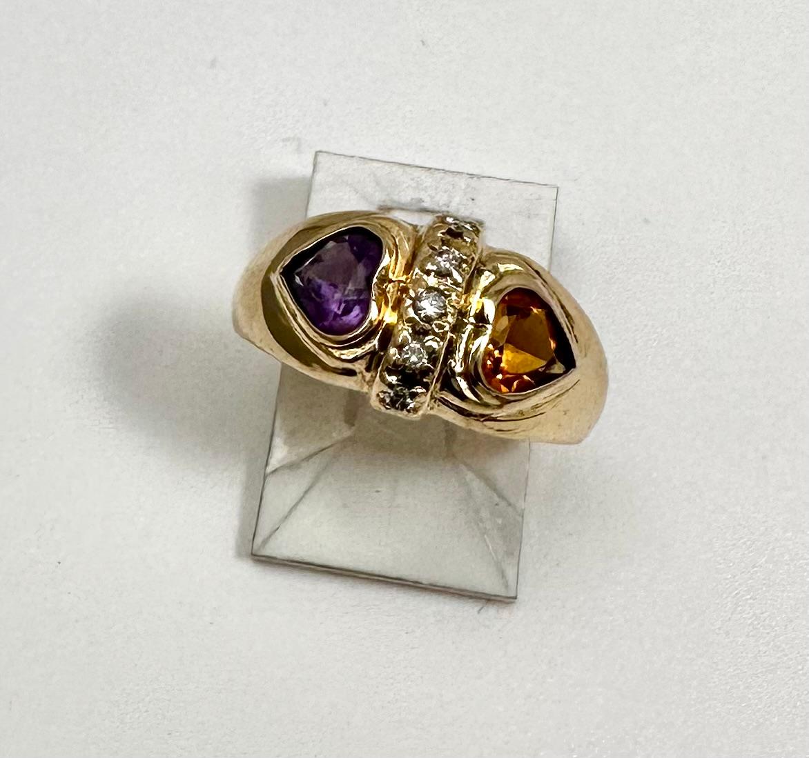 14k Yellow Gold 5mm Heart Shaped Citrine and Amethyst Diamond Ring  Size 4 1/2
Width of band approx 9.4mm

Often viewed as a stone of peace, some believe amethyst's calming presence produces soothing dreams by bringing the dreamer more in tune with