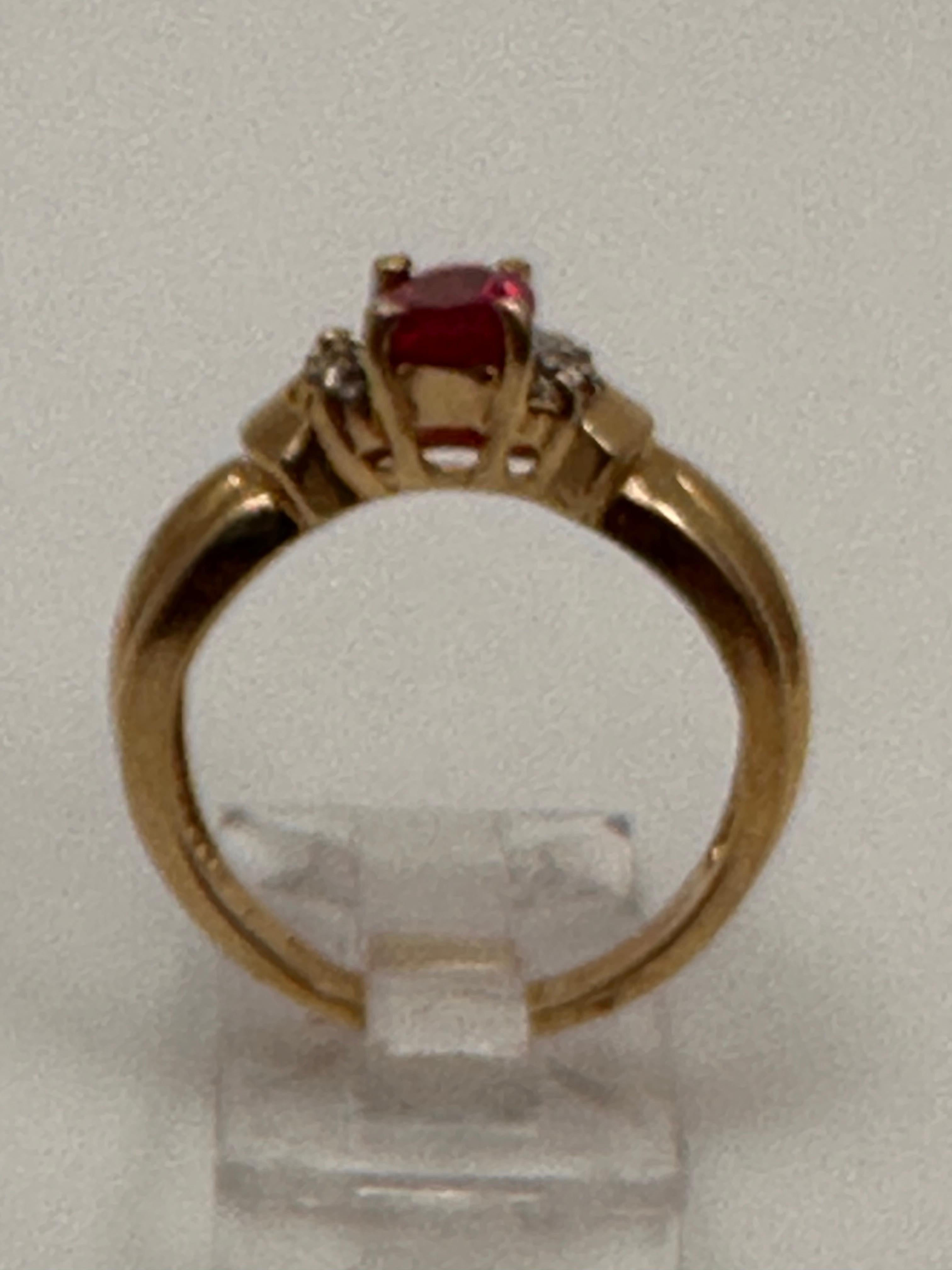 14k Yellow Gold ~ 5mm x 7mmm Oval Synthetic Ruby and Diamond Ring Size 6 1/4 For Sale 2