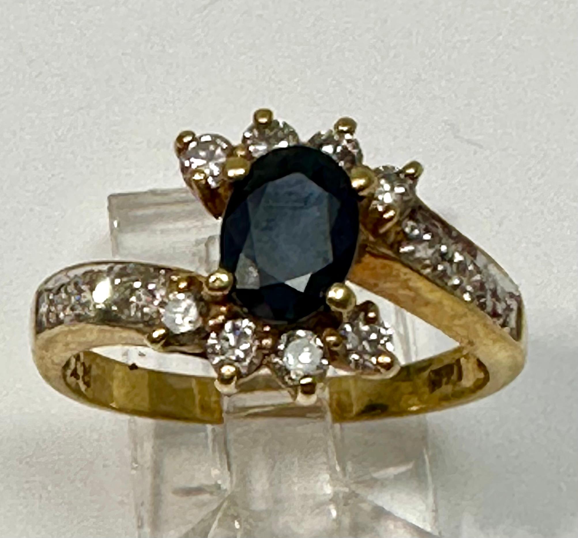 14k Yellow Gold ~ 5mm x 8mm Oval Sapphire ~ 14 Diamonds Ring ~ Size 7 1/4

Oval Sapphire measures 5mm x 7mm

Meaning: Sapphire is a stone of wisdom and royalty, often associated with sacred things and considered the gem of gems, guiding individuals