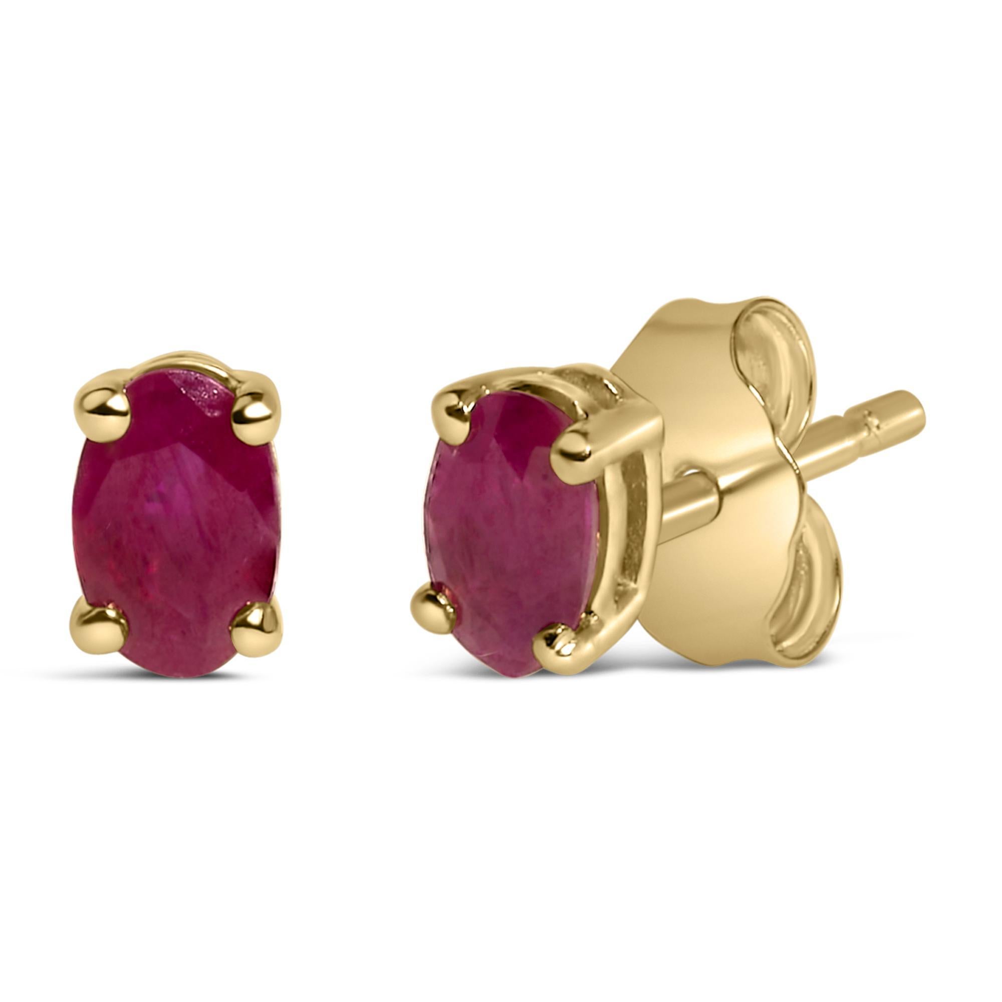 Immerse yourself in the splendor of these resplendent stud earrings, each adorned with a natural, oval-cut red ruby, elegantly cradled in the warm embrace of 14K yellow gold. At 5x3 mm, these rubies have been thoughtfully oiled to enhance their