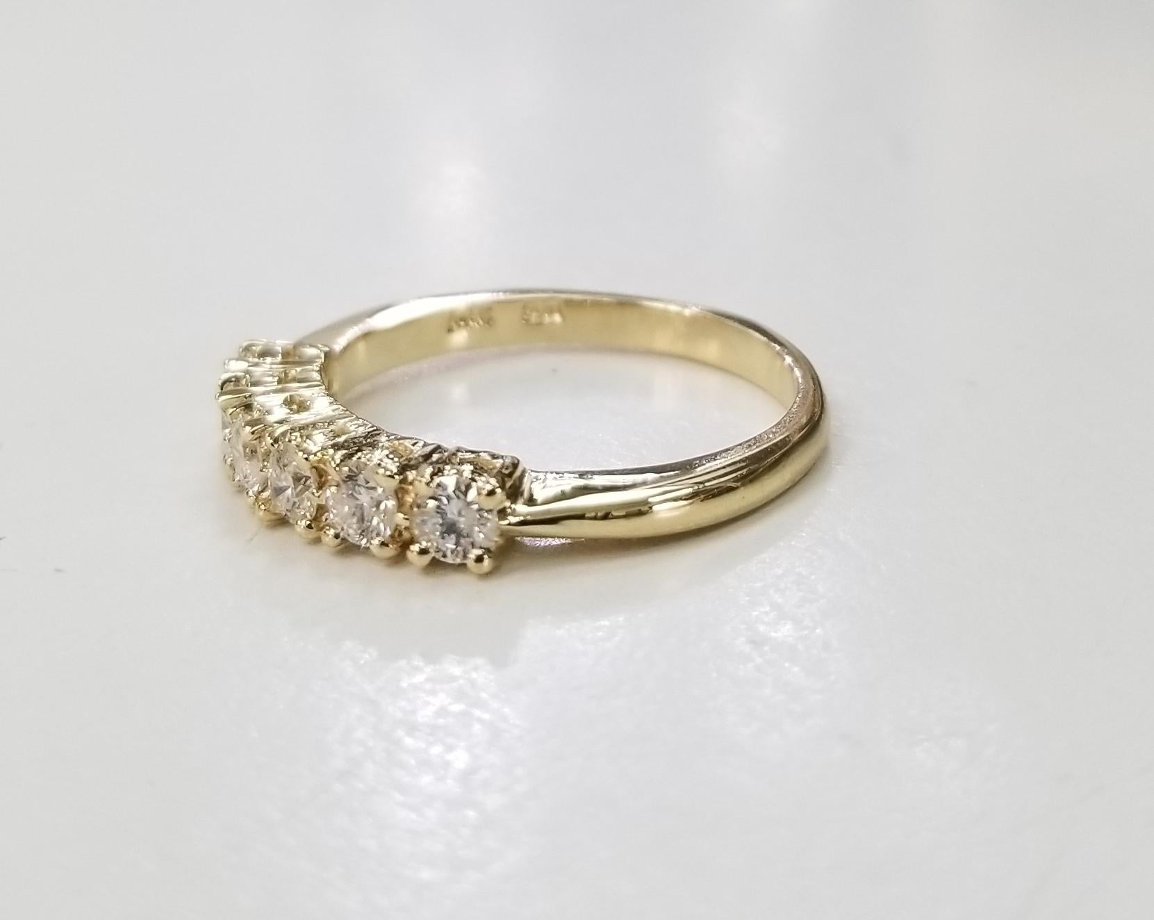 14k yellow gold 6 diamond ring wedding anniversary ring .52pts., containing 6 round full cut diamonds of very nice quality weighing .52pts.  ring size is 7 and can be sized to fir for free.