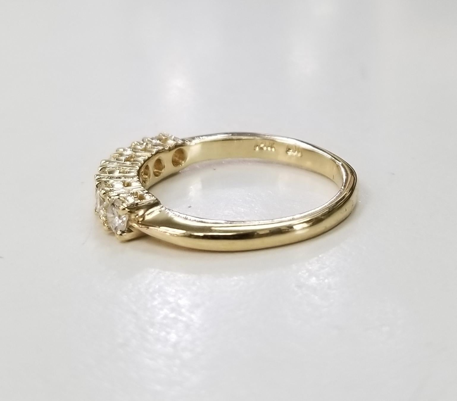 gold ring with 6 diamonds